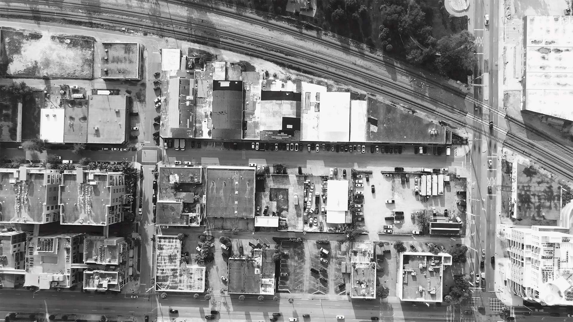 Black and white aerial view of city blocks