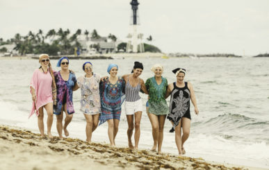 IU C&I Studios Portfolio And Page Group Of Seven Women Walking Along The Beach By The Water All Smiling