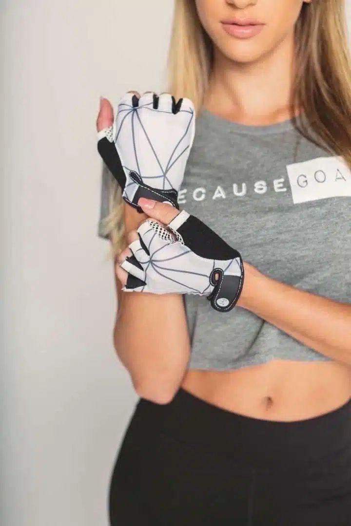 Nicole Mejia's Thick + Fit 1 Female athlete showing off workout gloves