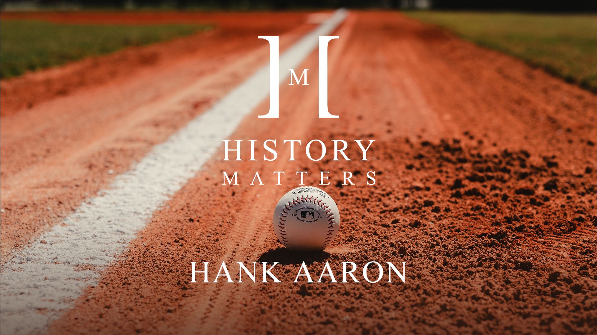 History Matters Hank Aaron by Bob Denison with background of a baseball near a baseline