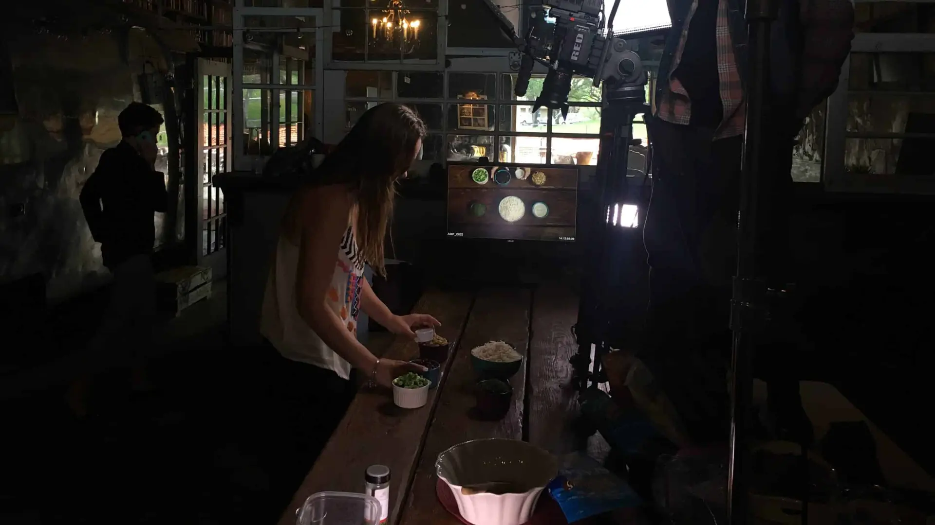 Beanfields Snacks 237 Side profile of woman preparing a meal