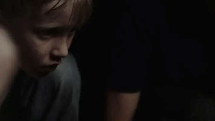 Corporate and Commercial Video Production 4 Boy with freckles looking off camera.
