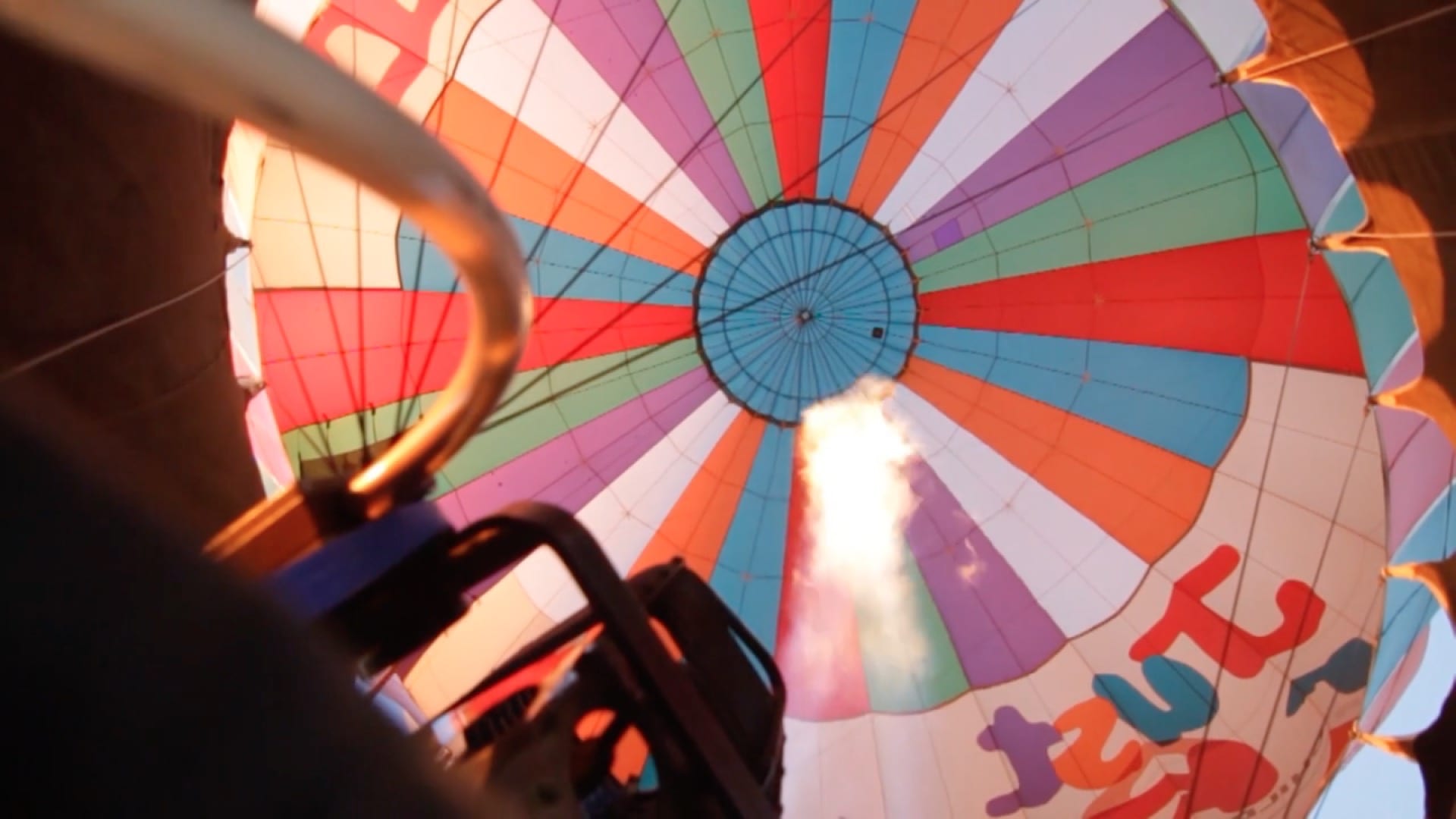 View looking into a multicolored hot air balloon