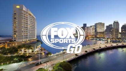 White Fox Sports Go logo against city background with bridge