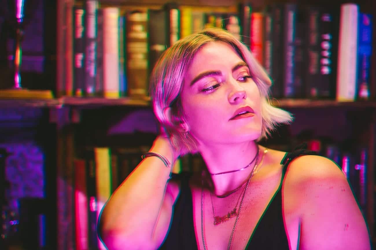 Social Media Influencers Next Door Photoshoot June 18th 2018 Headshot of a woman with short blonde hair looking off screen with some color distortion
