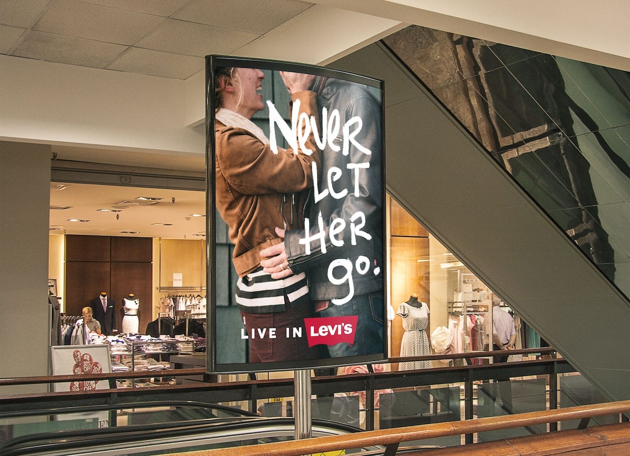 Our Secret to signing a list clients Never Let Her Go Levi ad in a mall