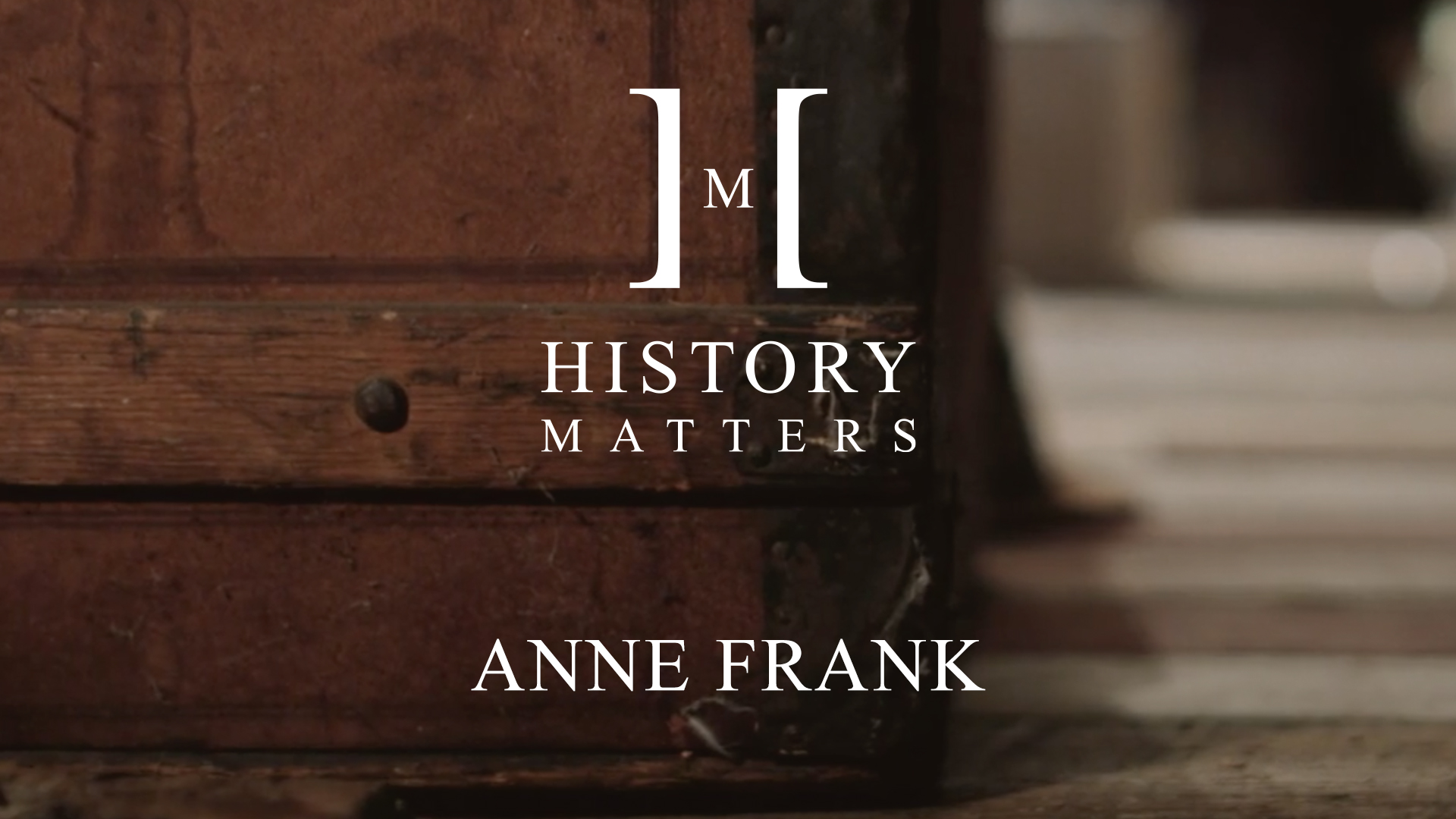 White History Matters Anne Frank by Beth Bryant logo with background closeup of a wooden trunk