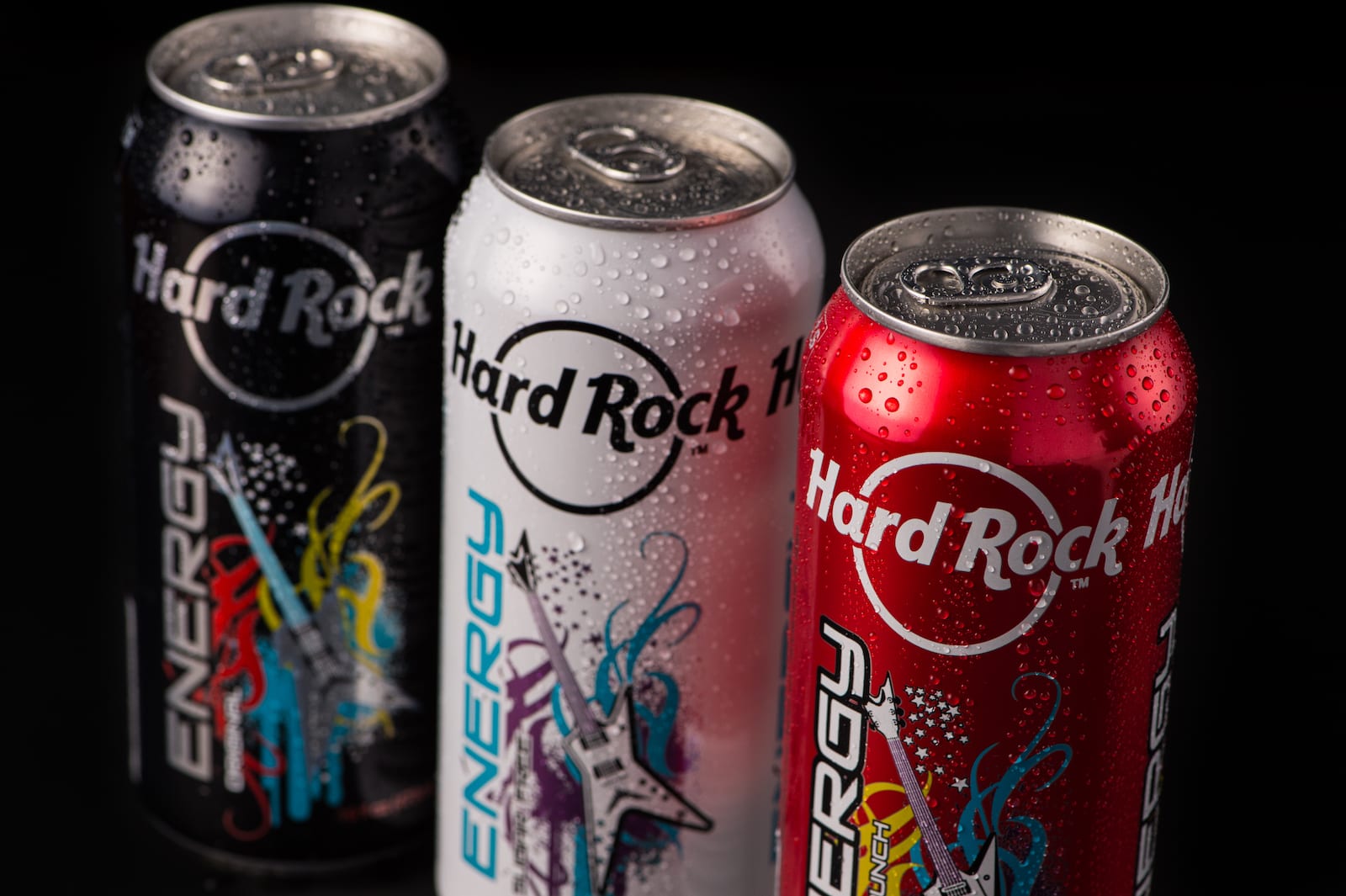 Hard Rock Energy, Marketing by C&I Studios Closeup of three cans of Hard Rock Energy drinks on display