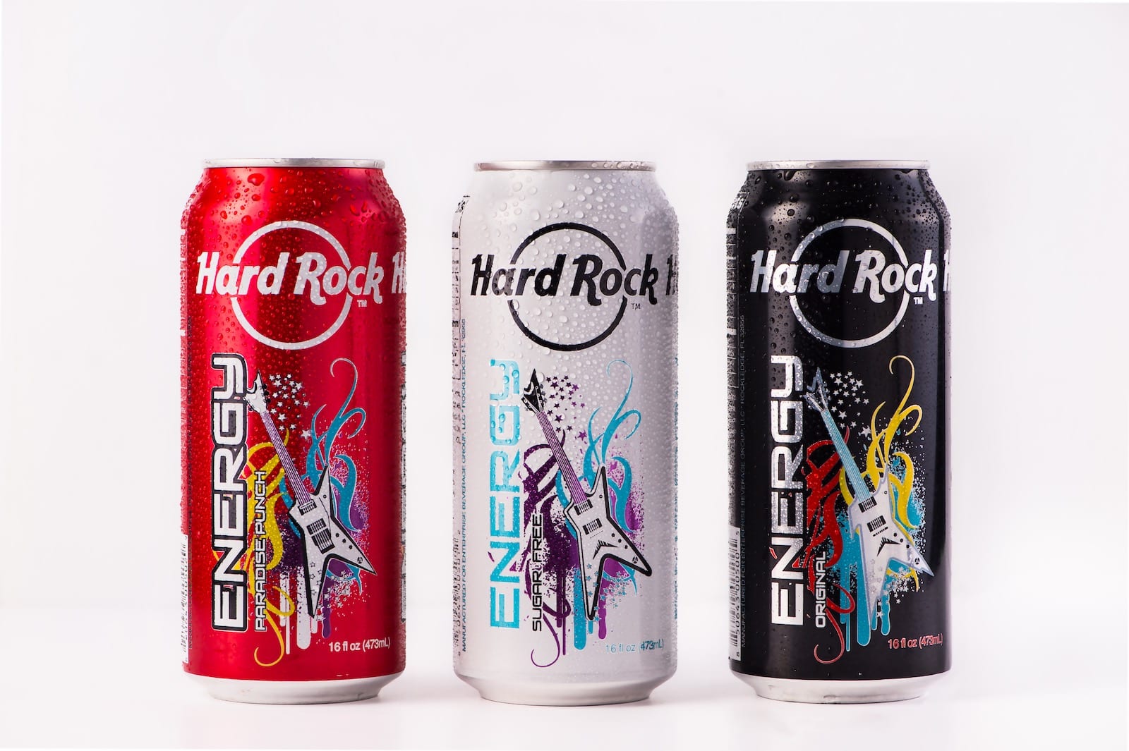 Three cans of Hard Rock Energy drinks on display