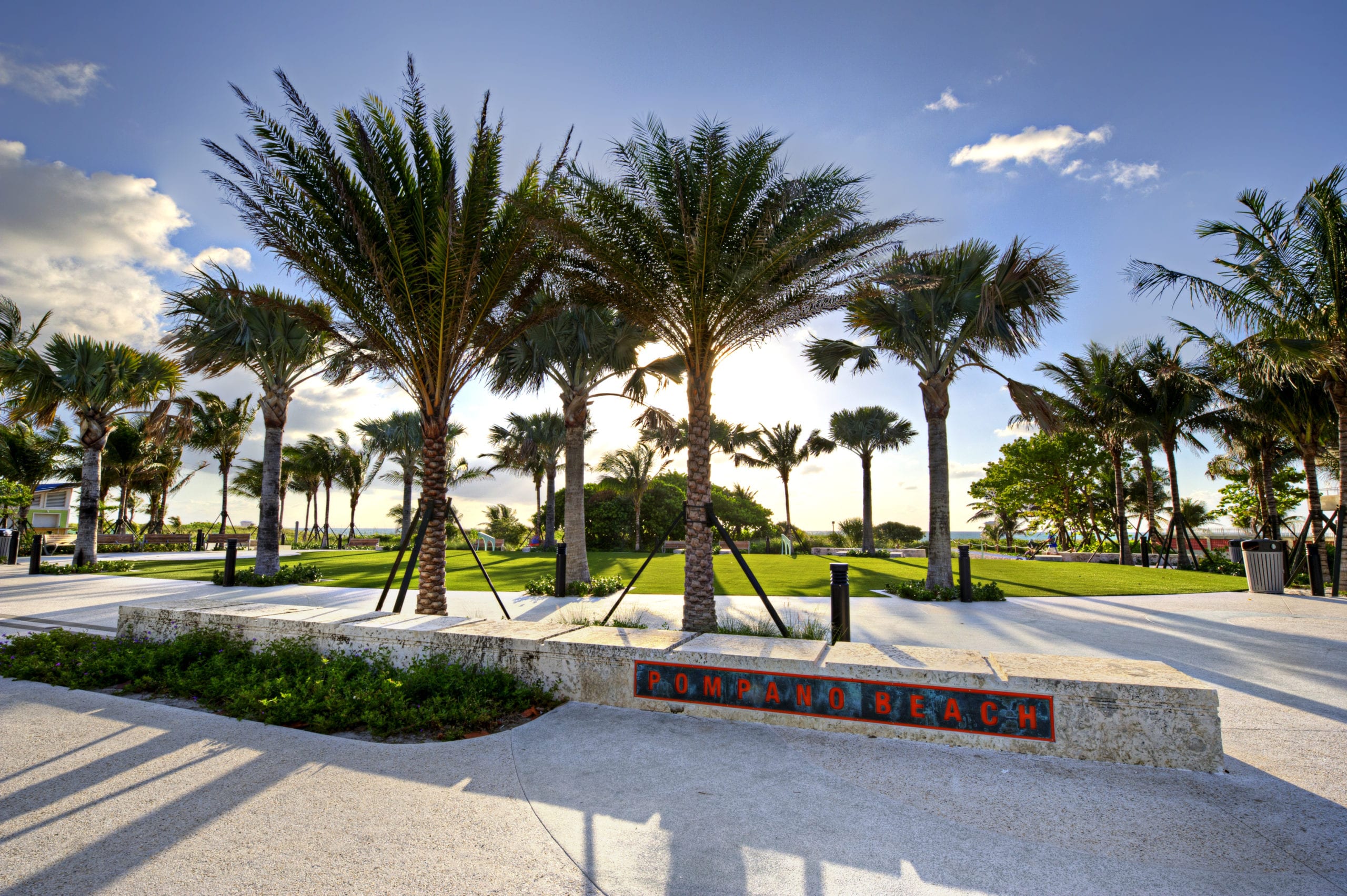 EDSA Pompano Beach Boulevard grounds with palm trees
