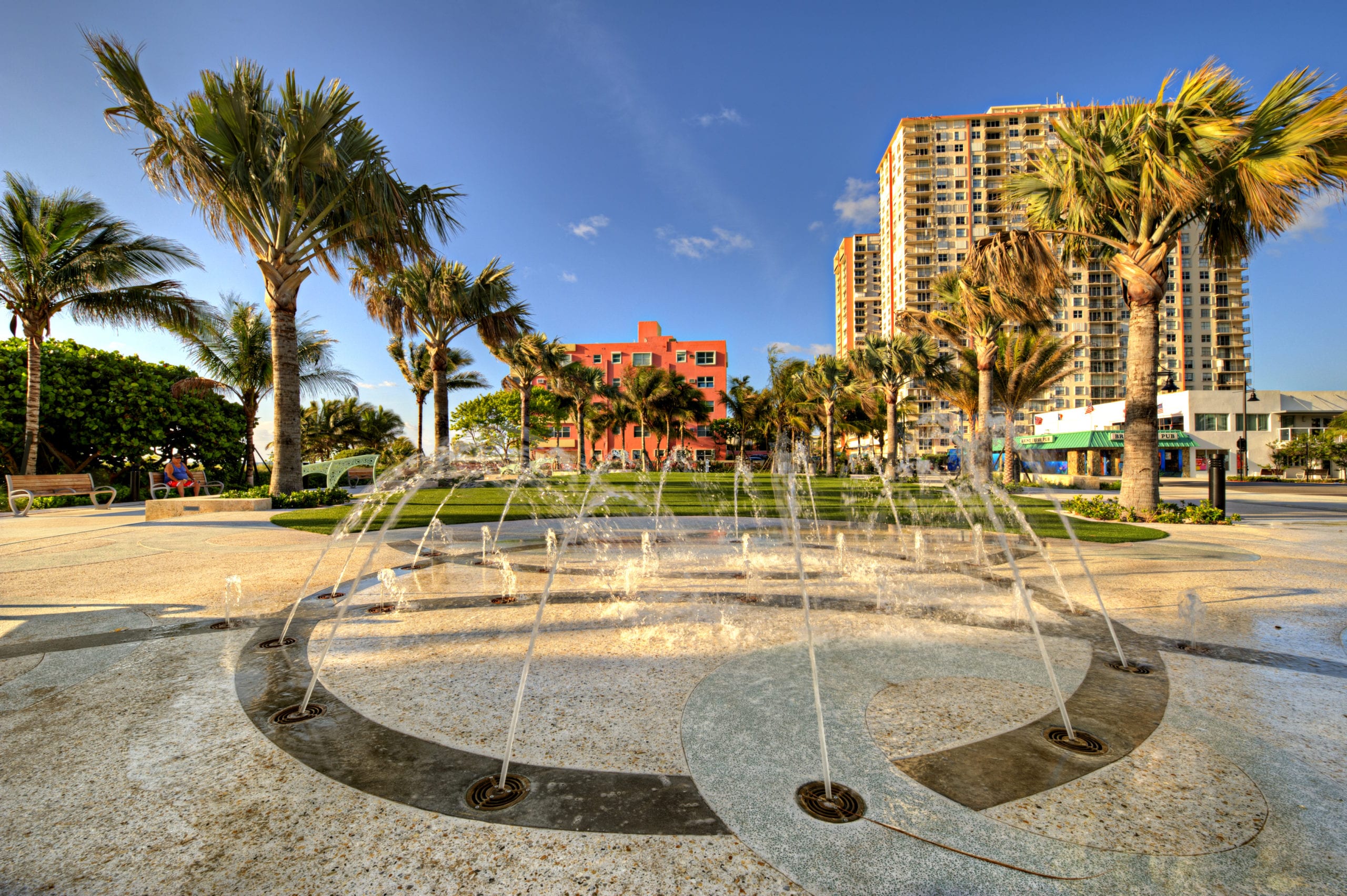 EDSA Pompano Beach Boulevard grounds with fountain water pool and palm trees