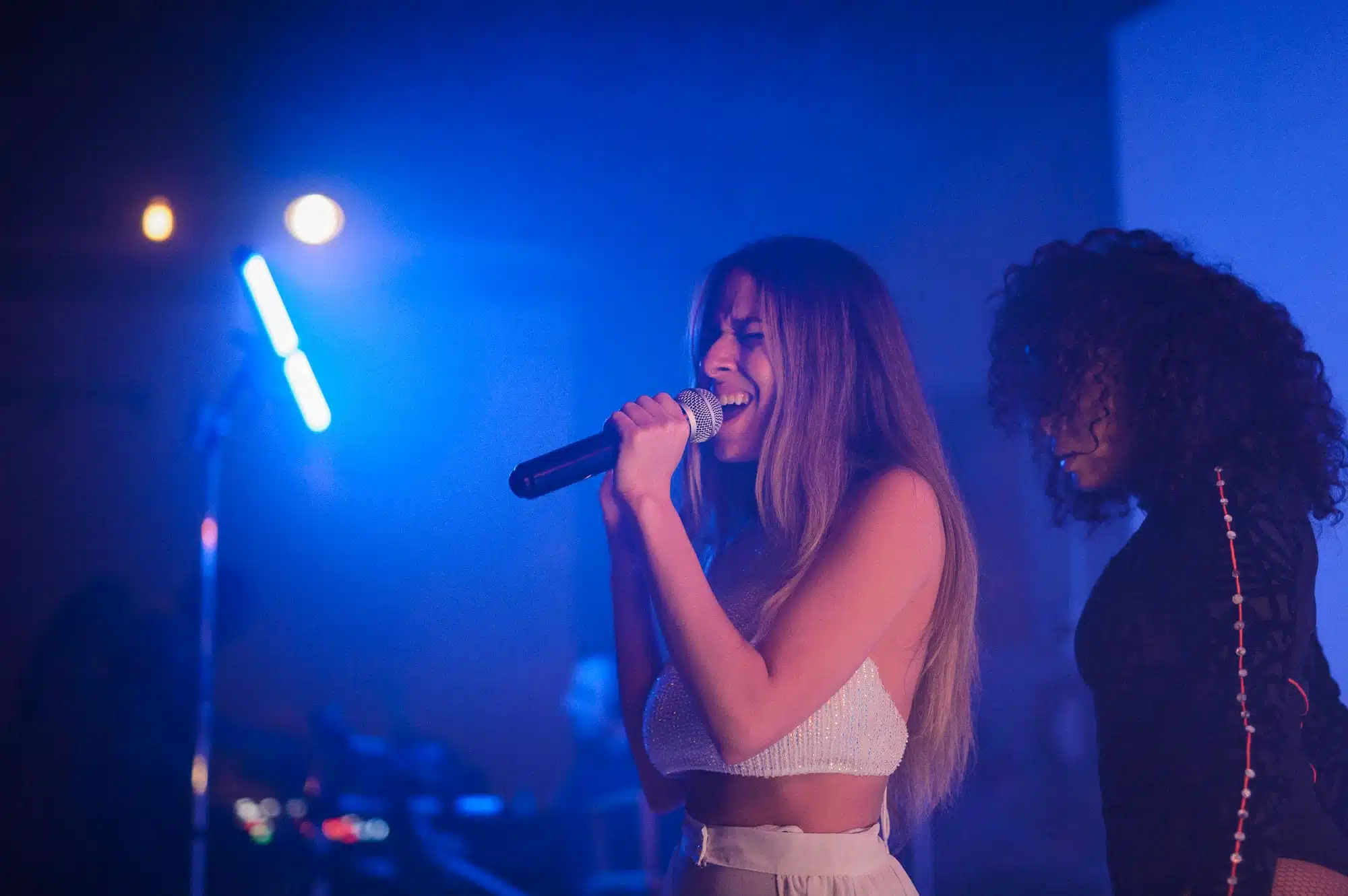 Keyword: Artist Management Services .Sabela and woman performing