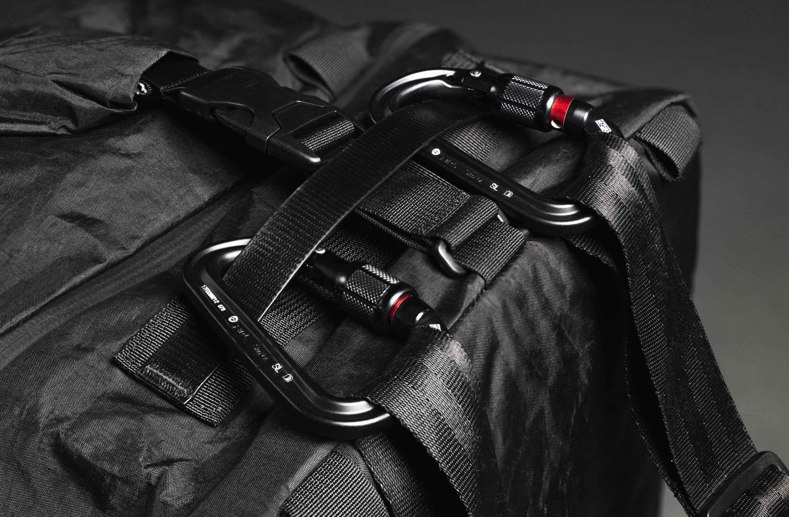 Black Mile Travel Bag Product Photography Closeup view of fasteners on black bag