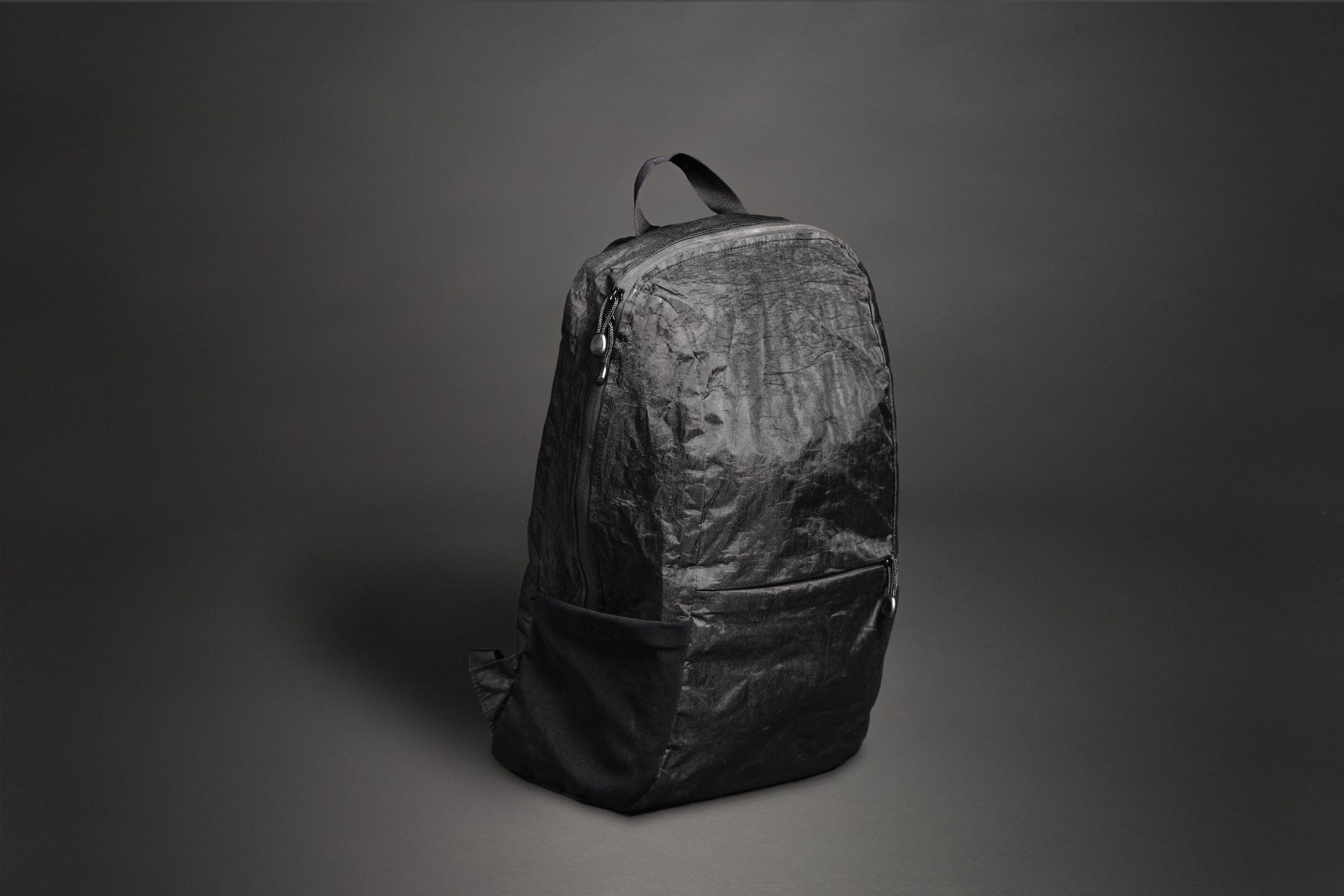 Black Mile Travel Bag Product Photography Black and white display of a backpack