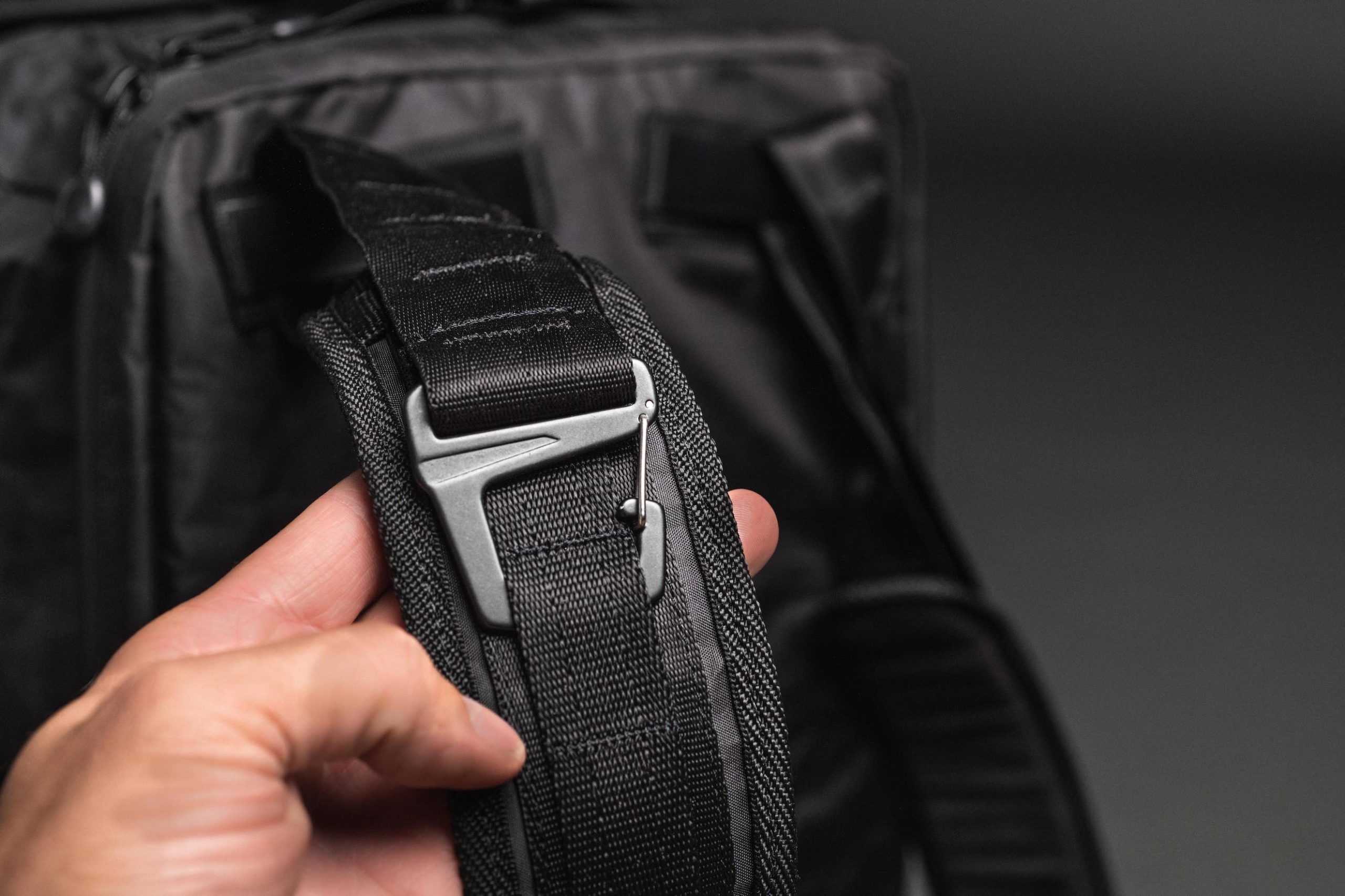 Closeup view of fasteners on black bag