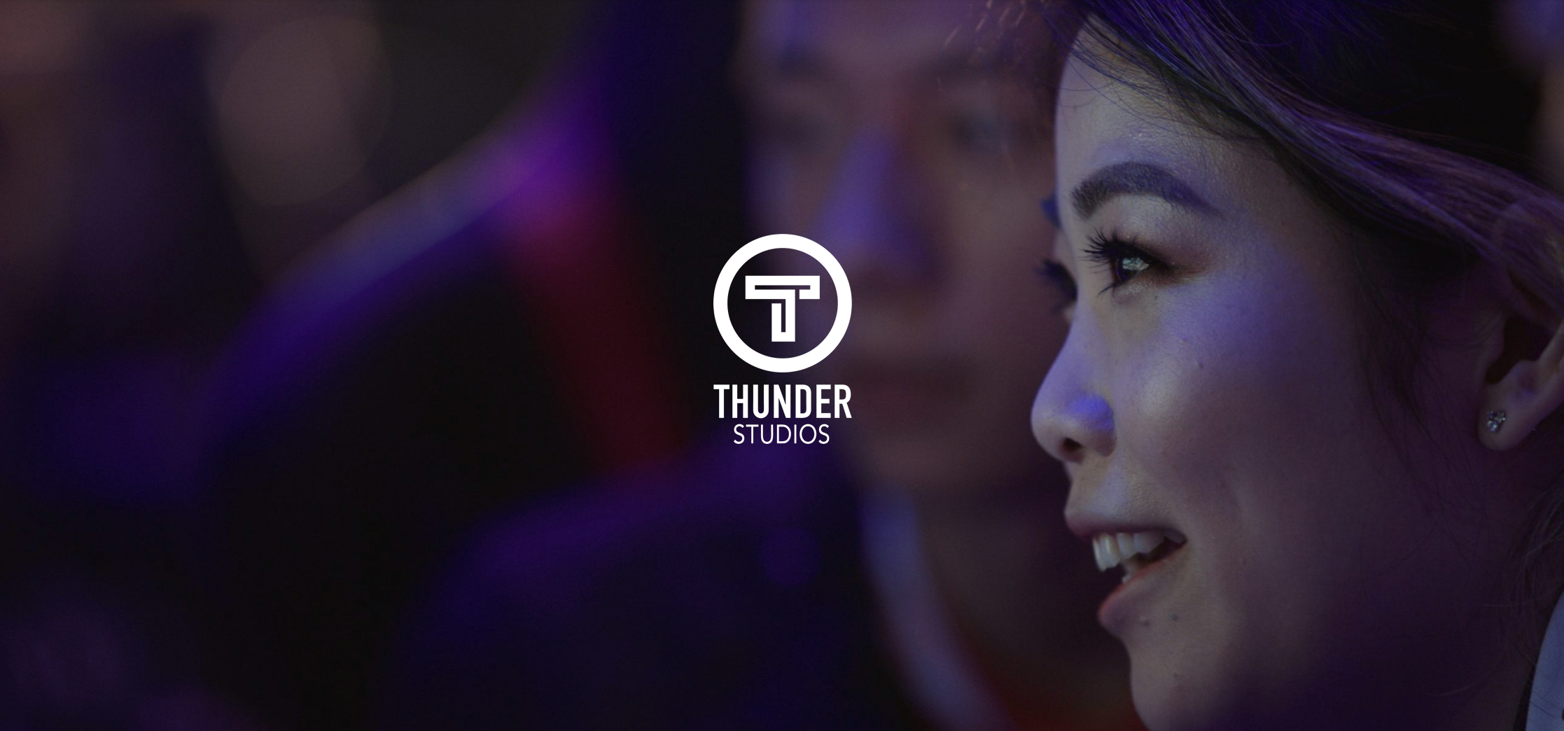 White Thunder Studios logo with oriental woman in background