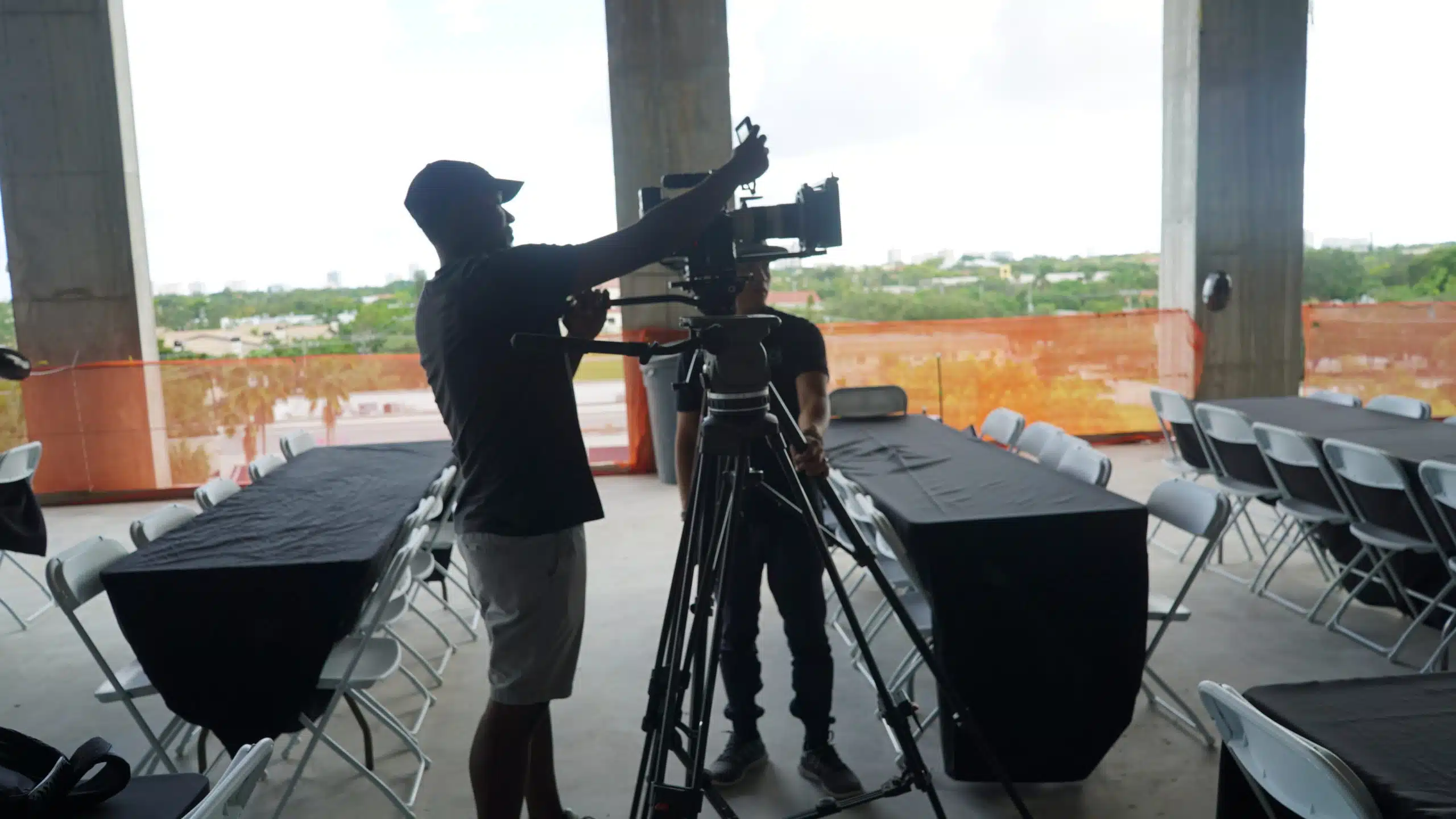 Camera crew working on setting up equipment