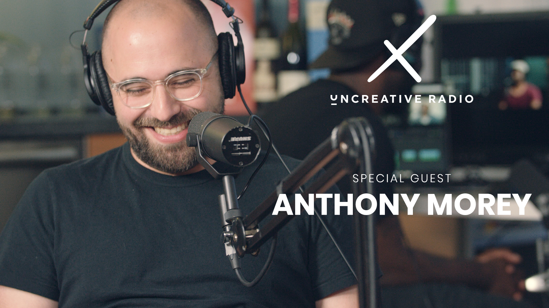 IU C&I Studios Page and Post Uncreative Radio with Anthony Morey title wearing headphones and smiling.