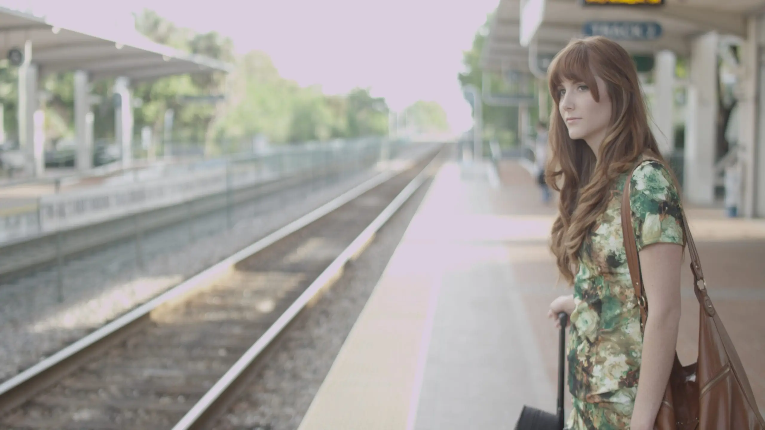 brand-building-with-video-marketing13 Side profile of woman standing on train station platform