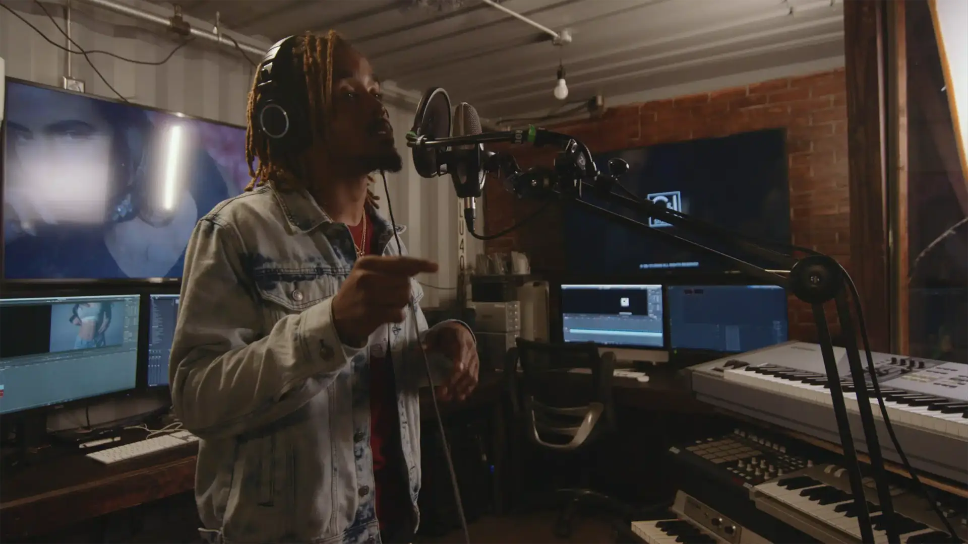 cis-post-brand-building-with-video-marketing Side profile of African American man singing in studio