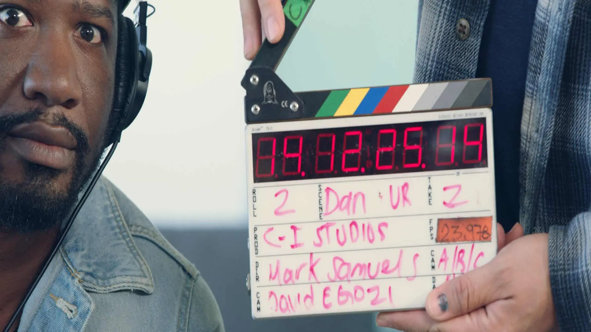 cis-post-brand-building-with-video-marketing5 Joshua wide eyed next to filming clapper