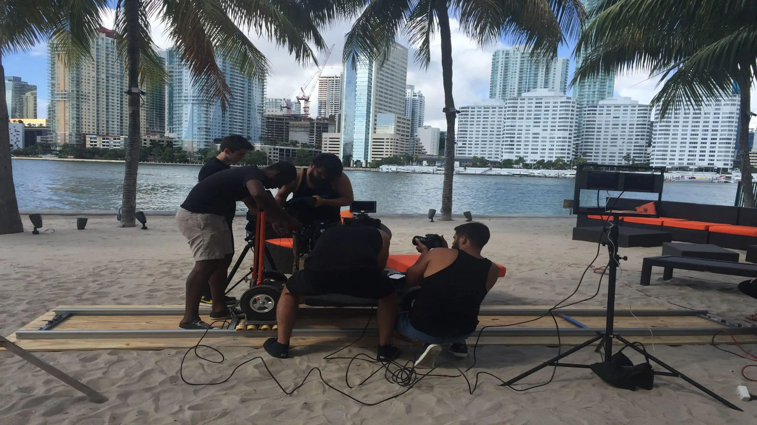 how-to-influence-others-through-video-production25 Crew of five men working on set