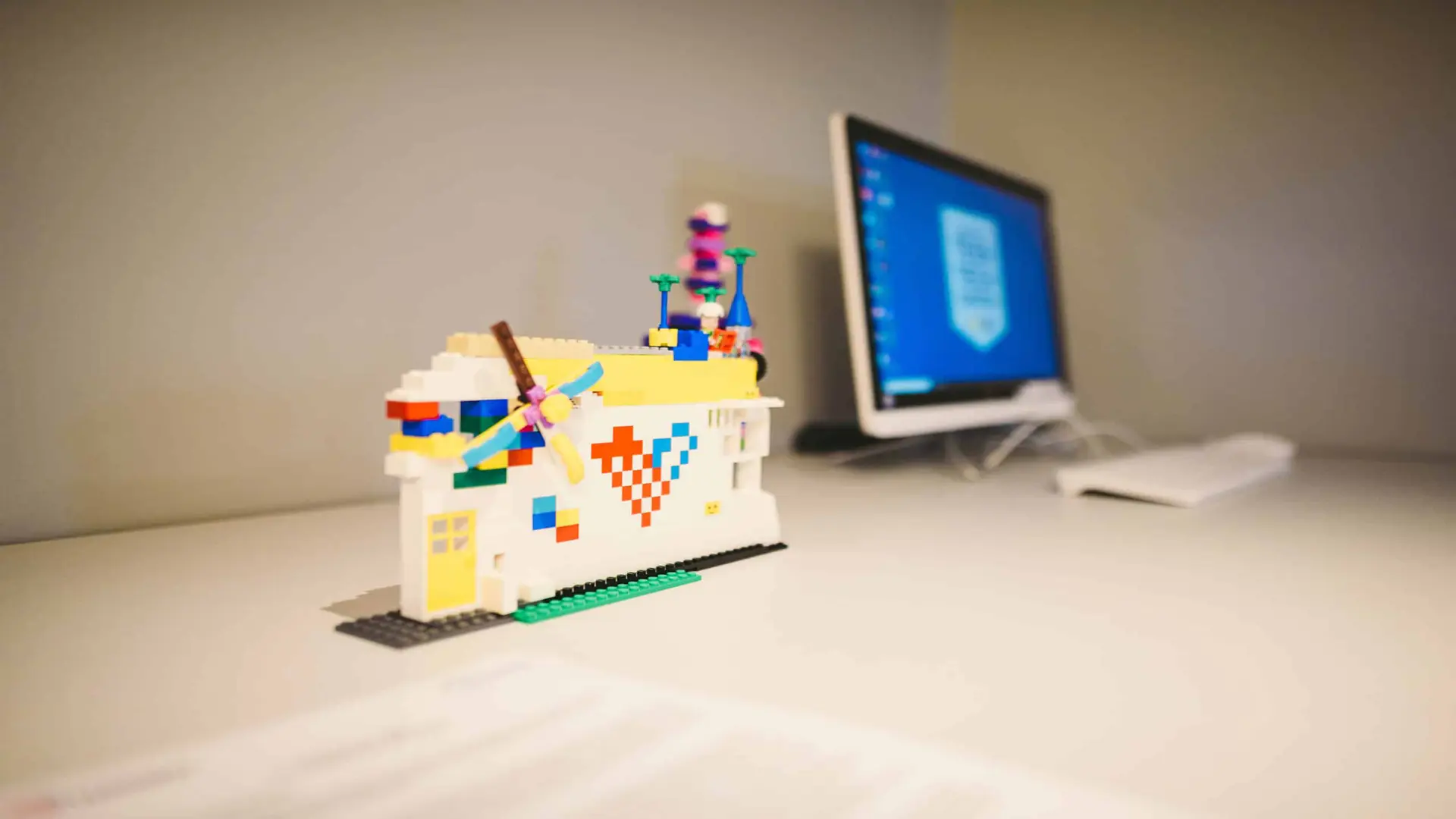 cis-post-tips-for-video-advertising3 Handy NonProfit Lego structure next to desktop