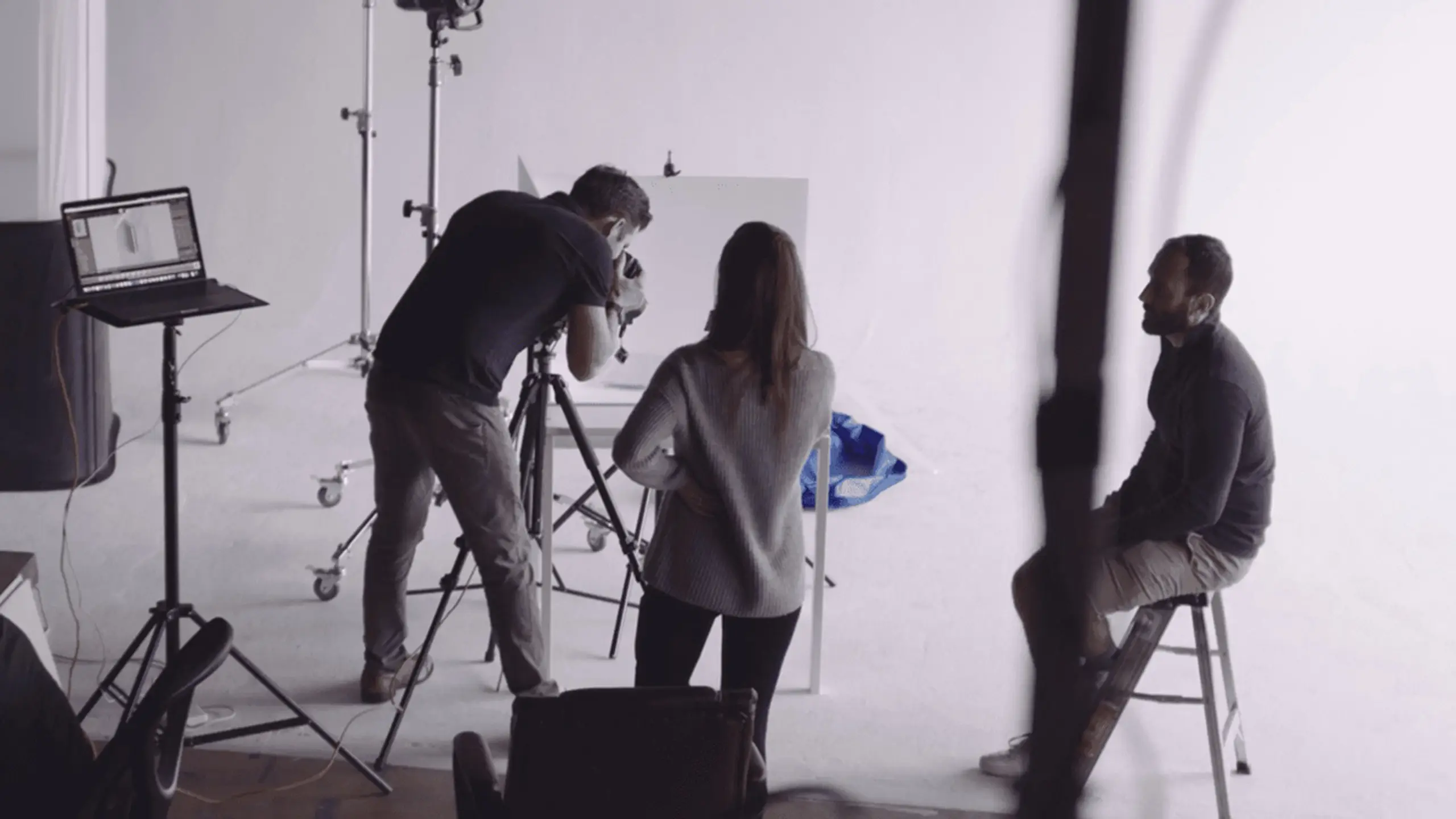 post-why-invest-in-video-marketing9 Man taking picture as a man and woman look on