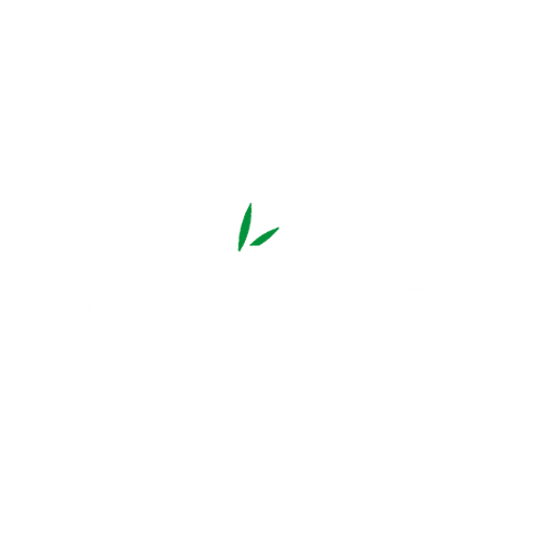 White JustCBD logo with green leaves