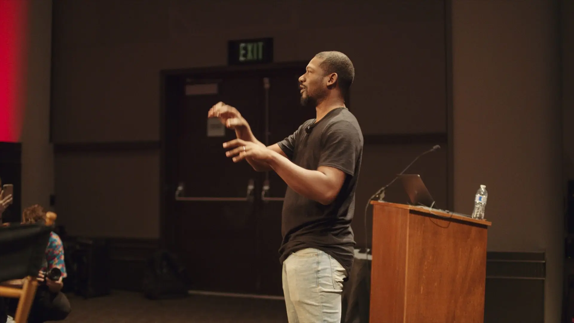 cis-post-editfest-2019-sponsored-by-blackmagic-design3 Side profile of Joshua talking to an audience