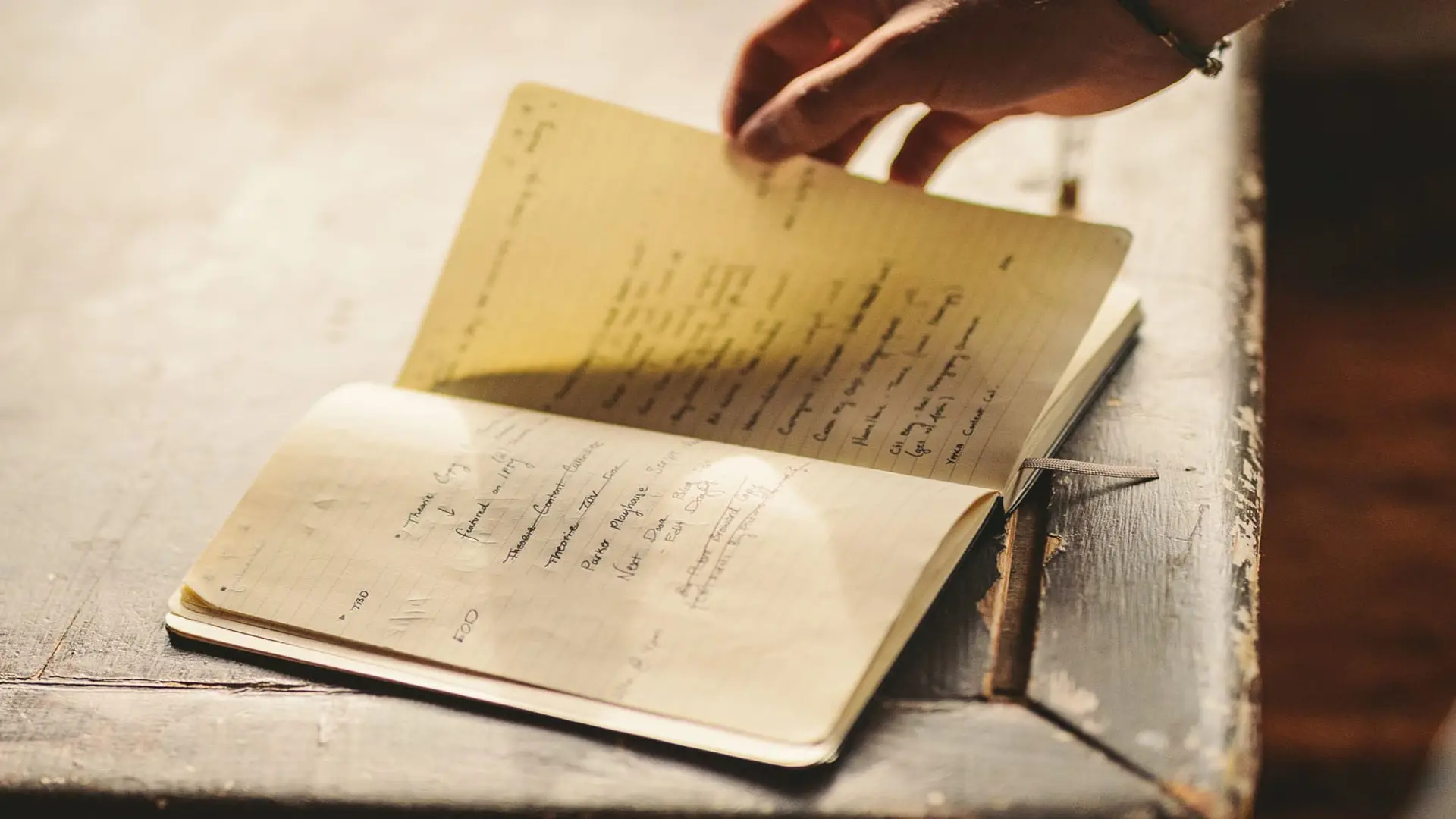 cis-post-top-ted-talks-on-storytelling2 Side profile closeup of writing in a notebook