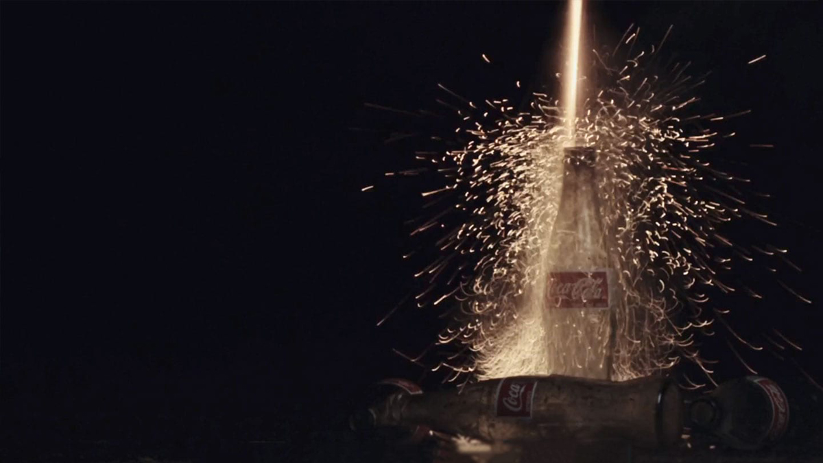 Coca Cola bottle getting sparks