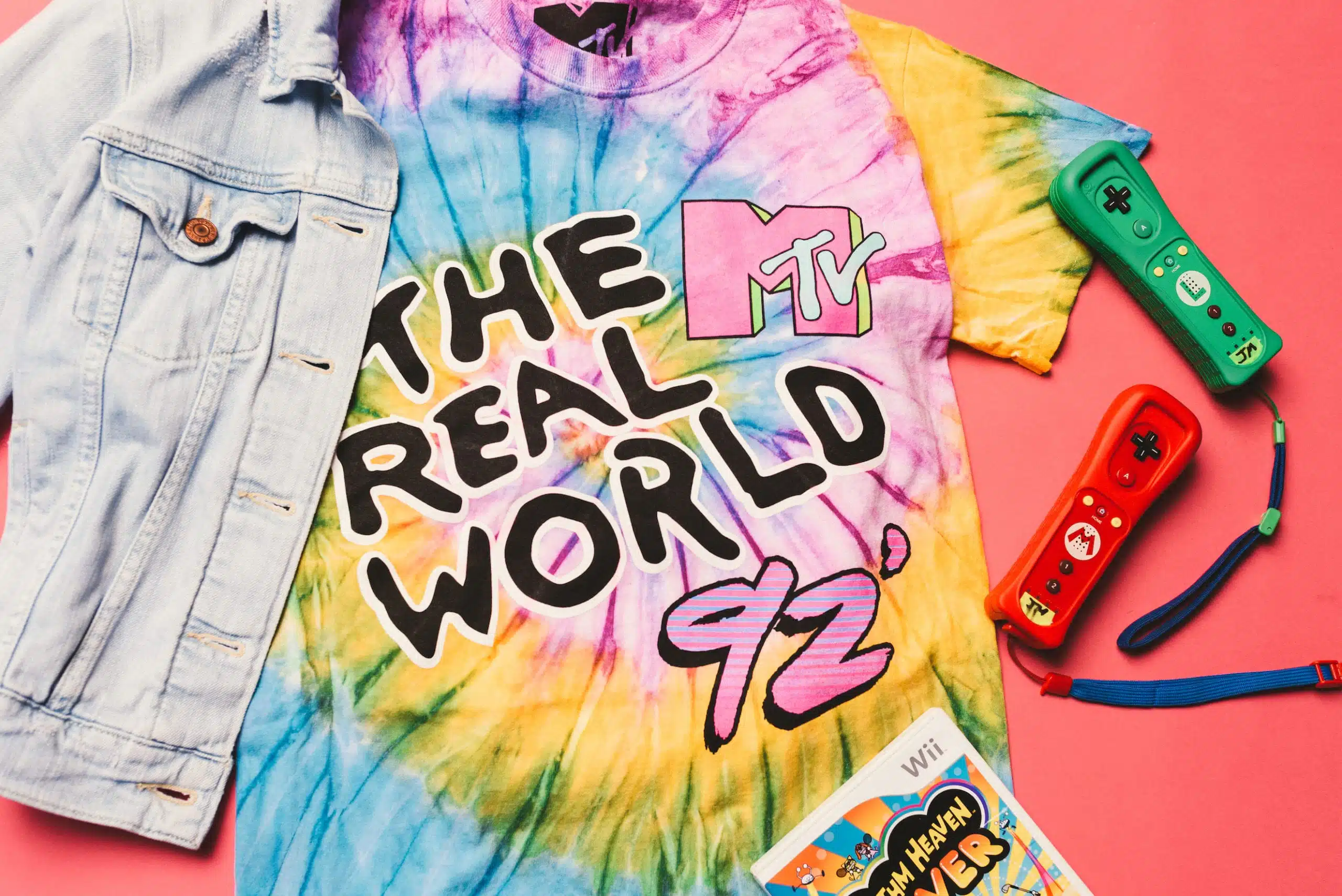Heart Piece Plus 12 Jean jacket, MTV t shirt, Wii game and a red and green Wii controllers on display