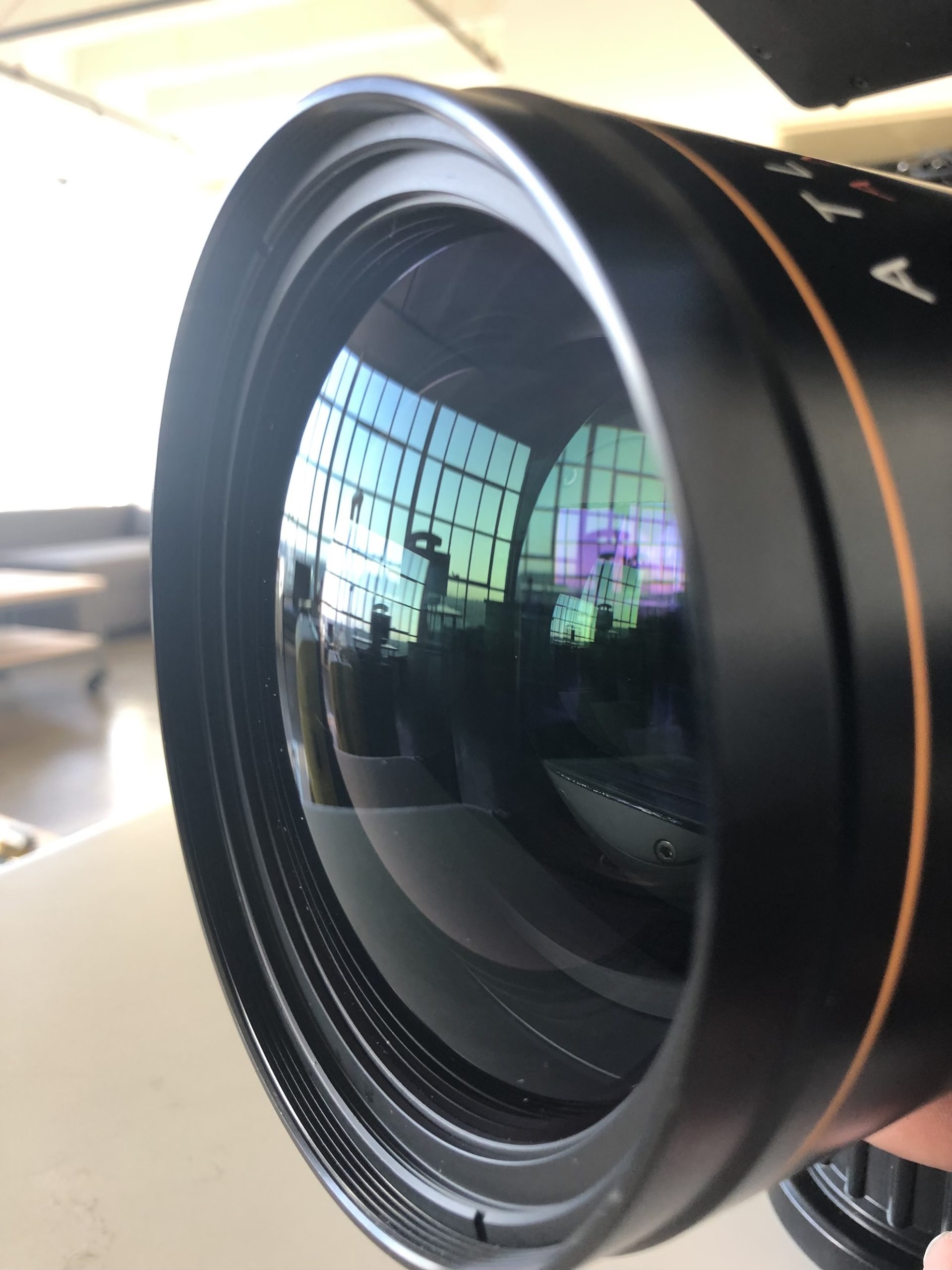 IU C&I Studios Portfolio Black Violin BTS Closeup of Red Digital Cinema Professional camera lens