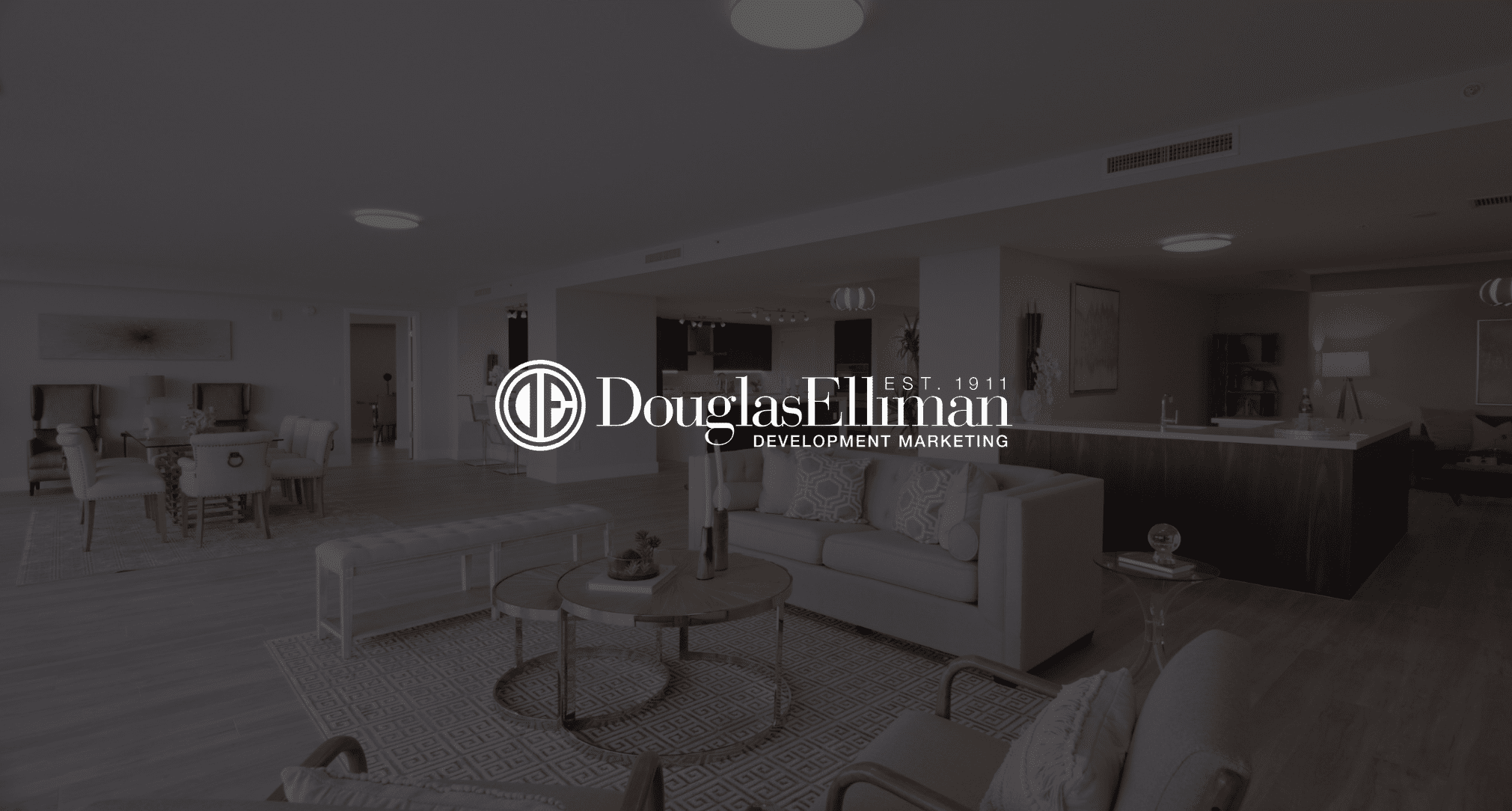 White Douglas Elliman Development Marketing logo Featured Image with black and white background of furniture in a living room and dining room of a house