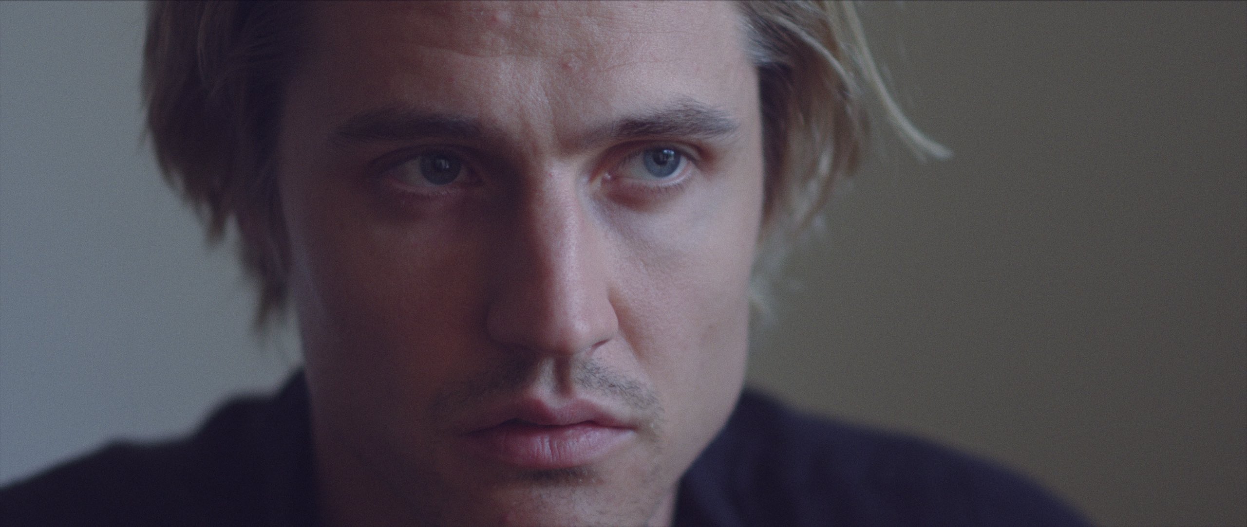 Jellyfish Short Film Produced by C&I Studios Closeup of man with short blond hair headshot