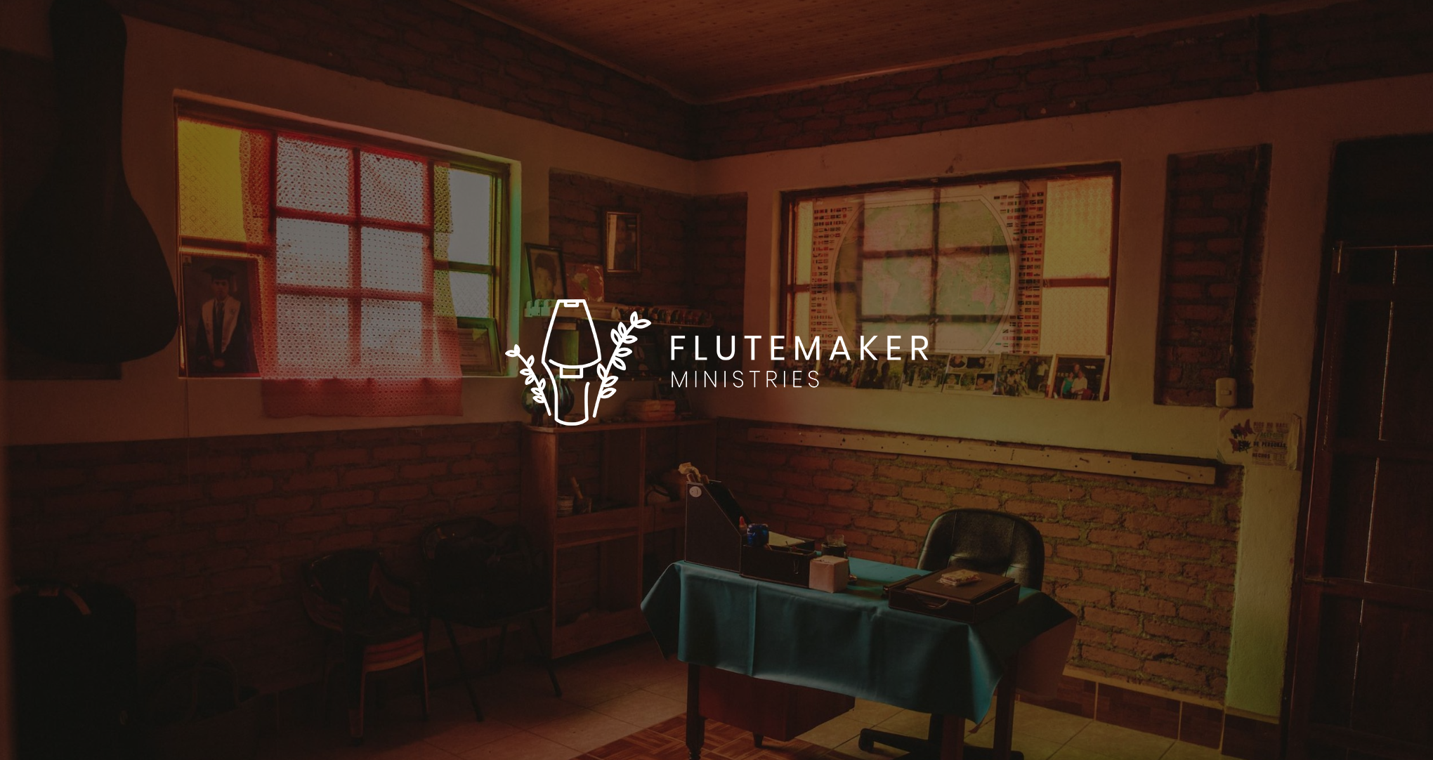 White Flutemaker Ministries logo Video Documentary with background of a room with a desk