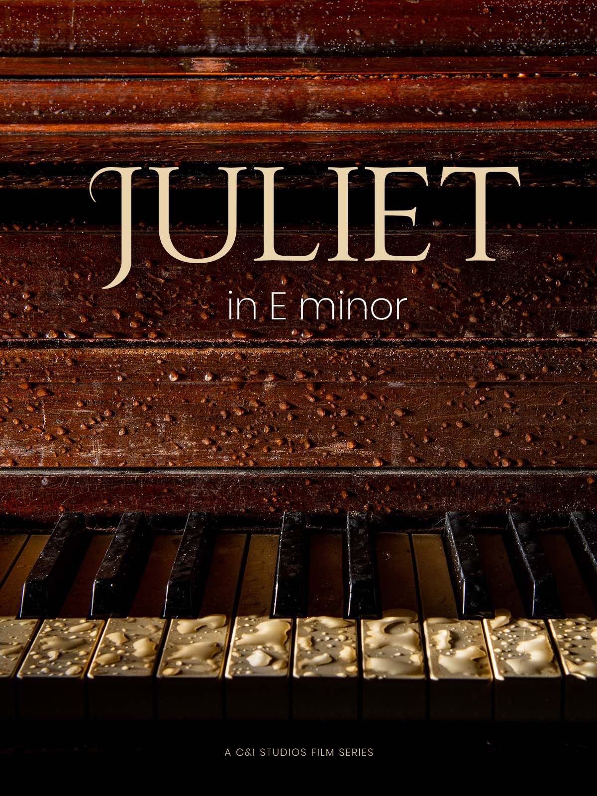 Juliet In E Minor, a C&I Studios Original Production Poster with closeup display of wet piano keys