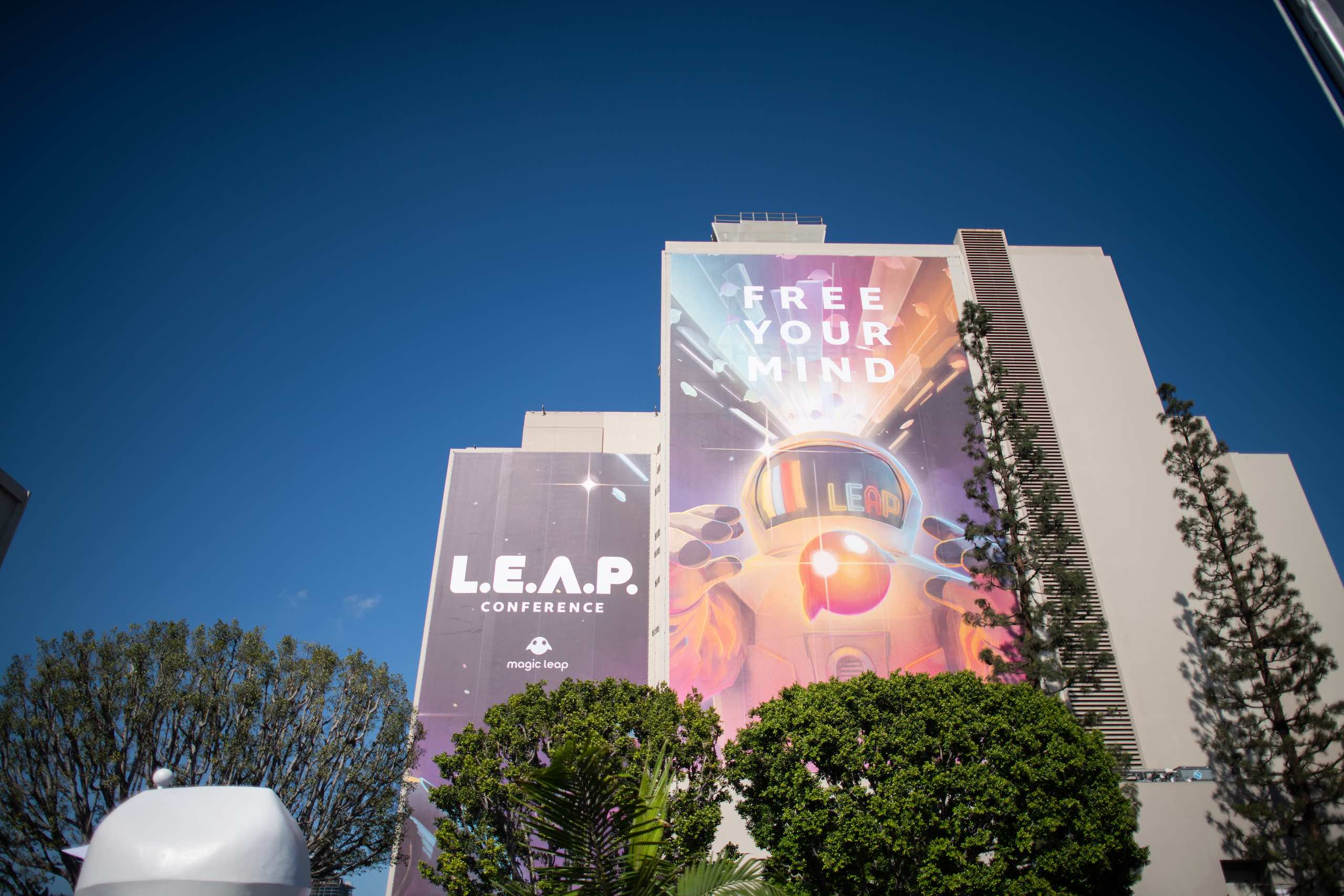 LEAP Conference Magic Leap and Free Your Mind banners on display on side of a building
