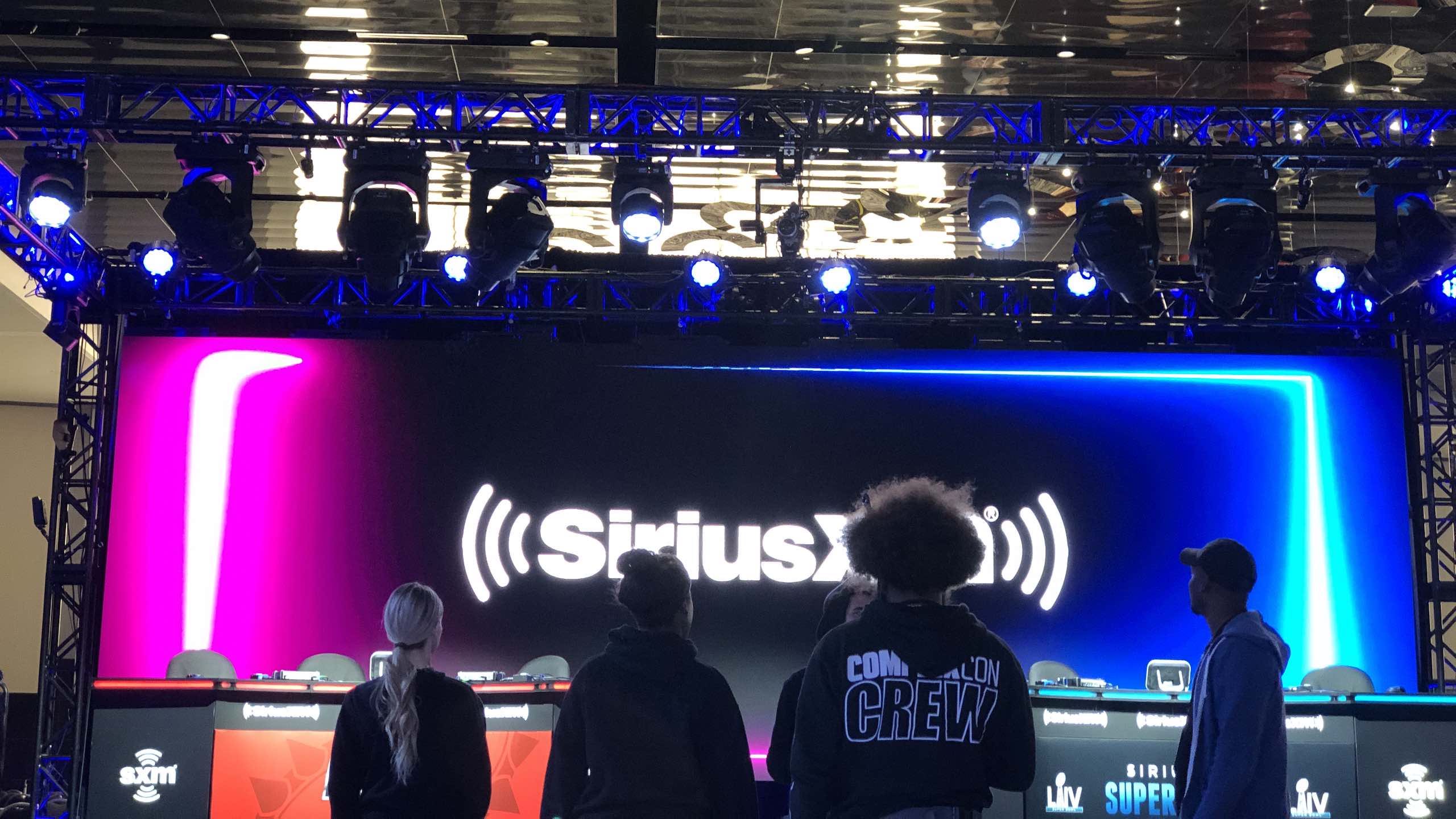 View from behind of crew members on floor of SiriusXM event