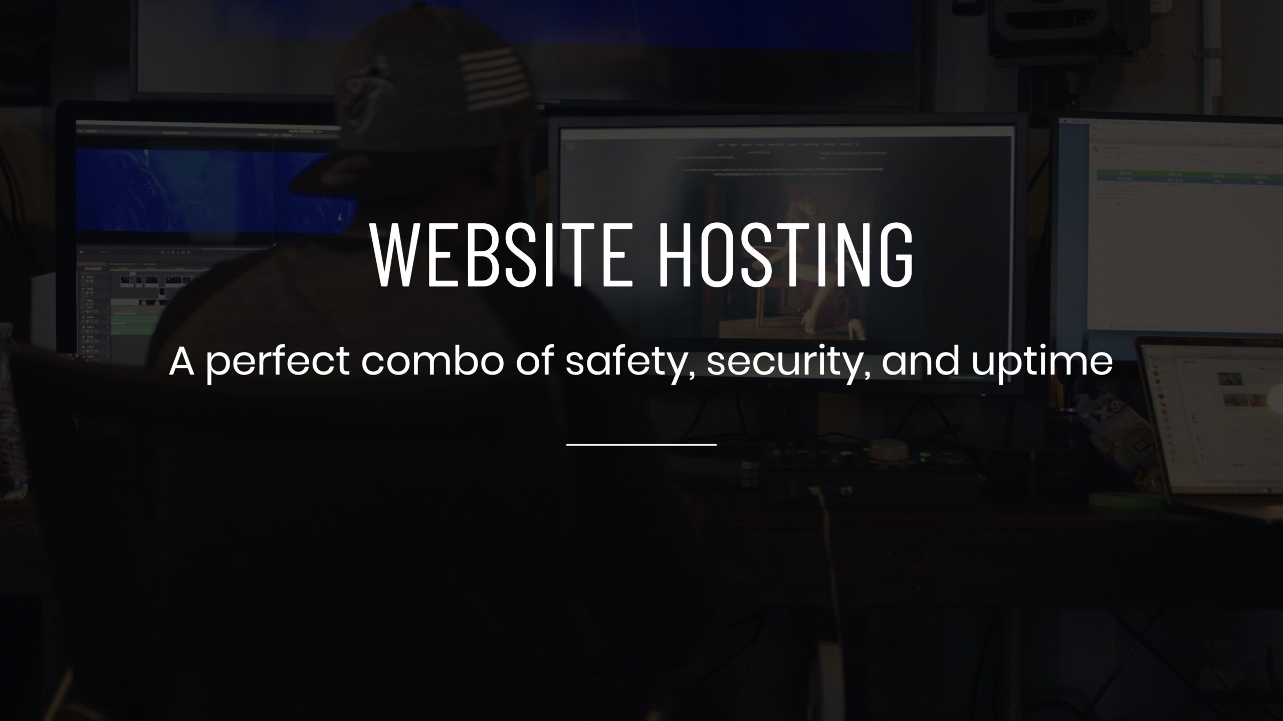 White Web Hosting A perfect combo of safety, security, and uptime title Services by C&I Studios Tile on dimmed background view from behind of a man working at a desktop