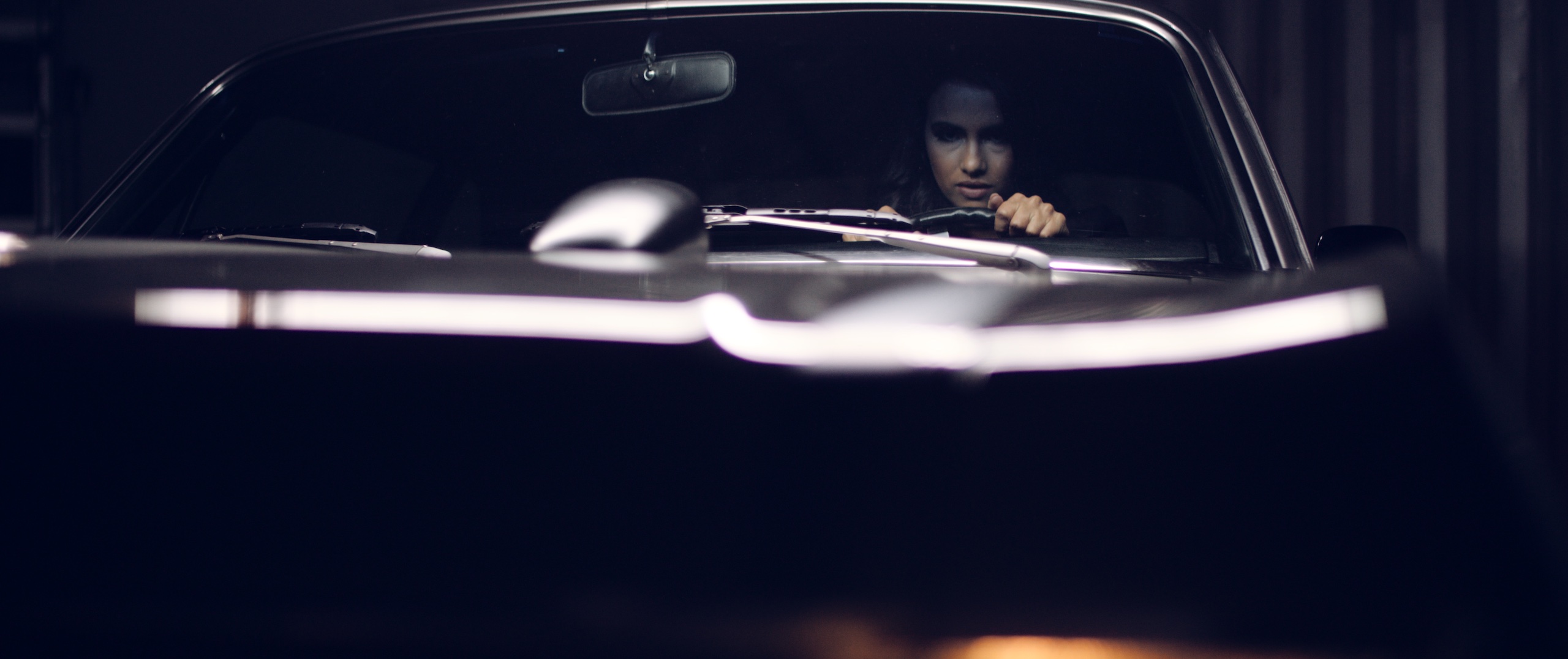 The Dailies Episode 202 BTS Footage with Mercedes Gutierrez sitting in the driver's seat of the car