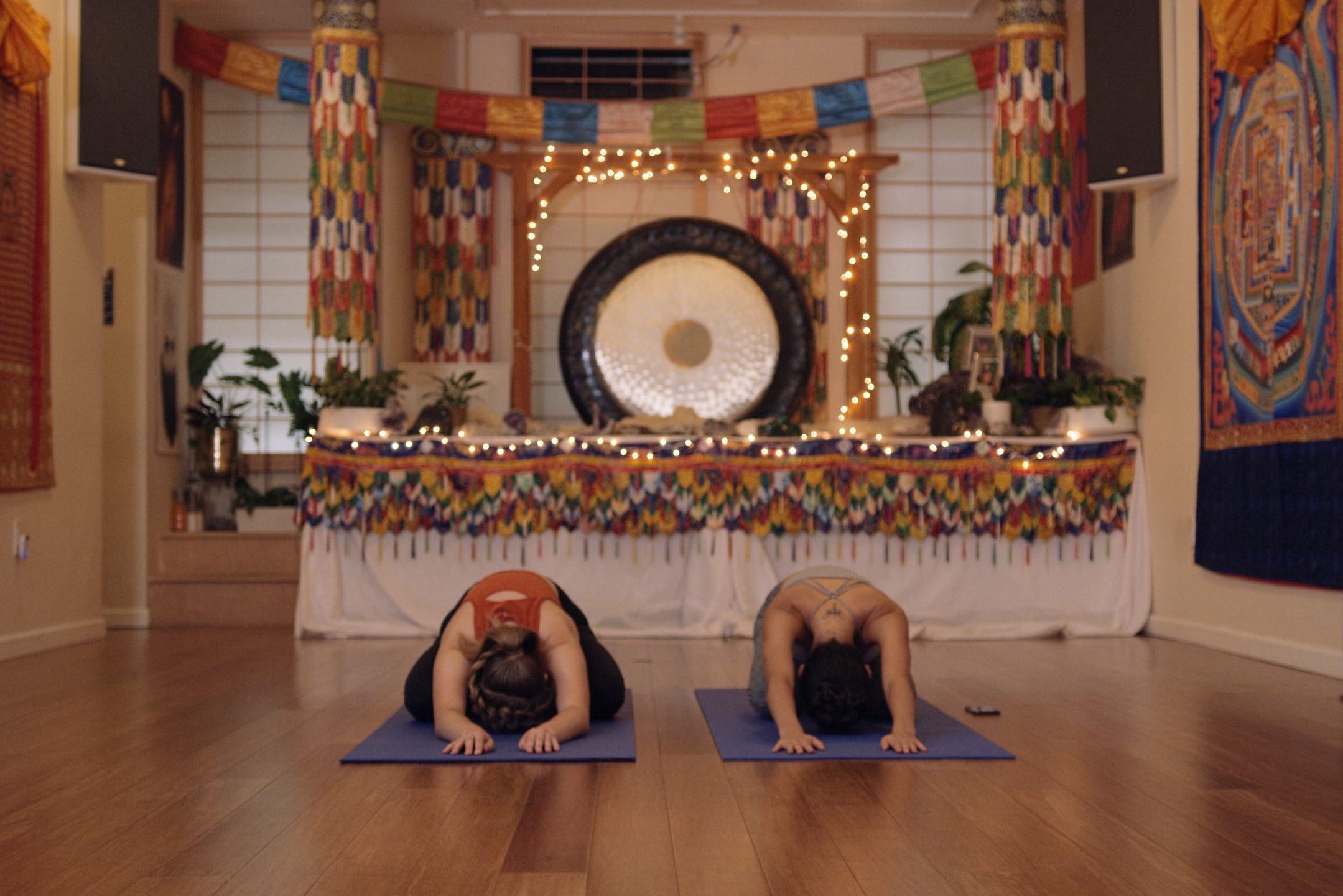 Production Resources Locations NYC with two women doing a pose on yoga mats