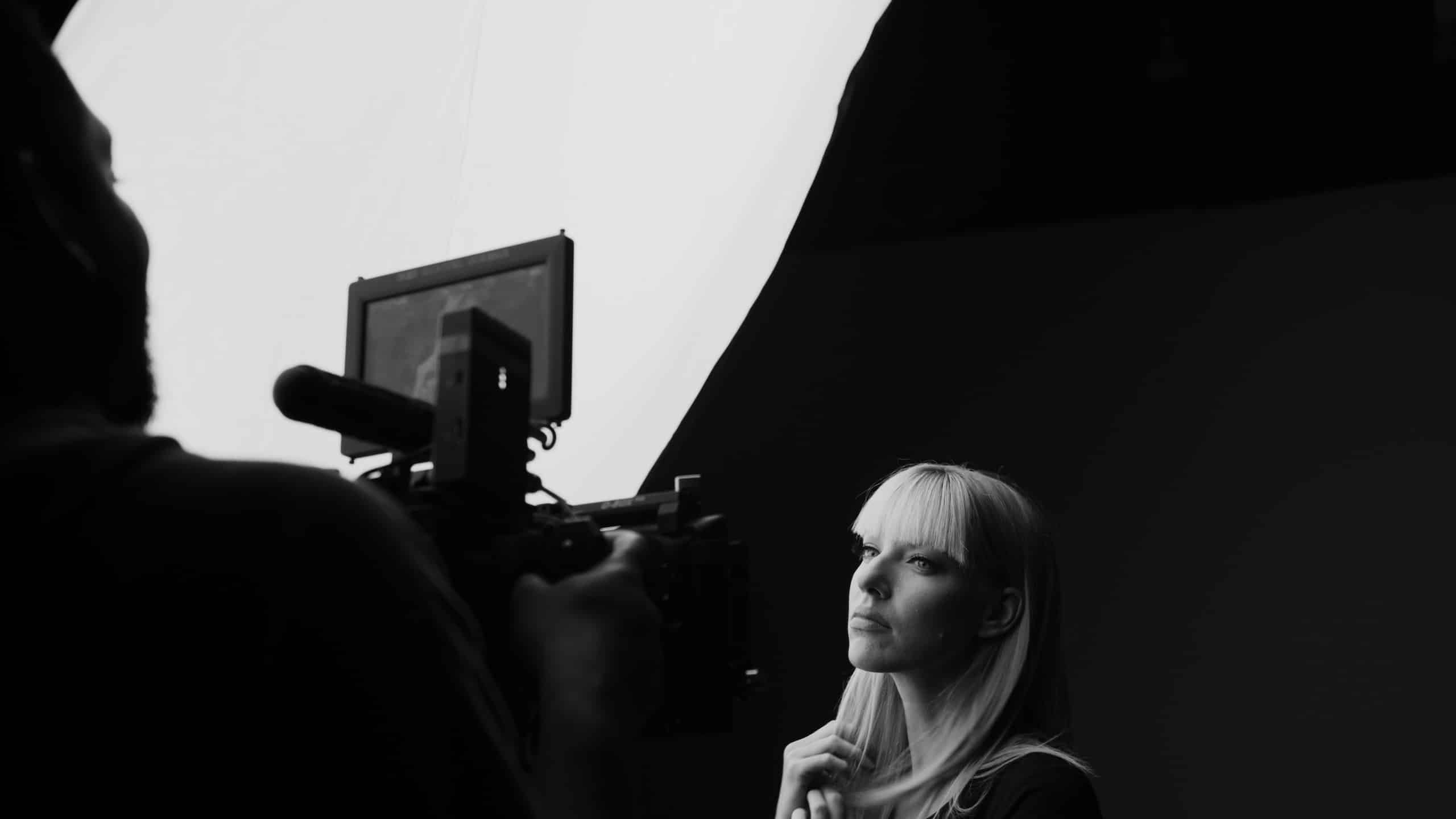 Uncreative Shop Behind the Scenes with AJ Knapp on the set of Uncreative Shop in black and white