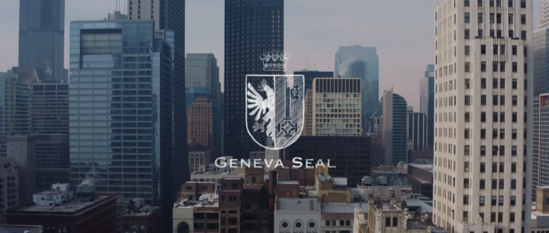 IU C&I Studios Page White Geneva Seal logo on background of aerial view of city