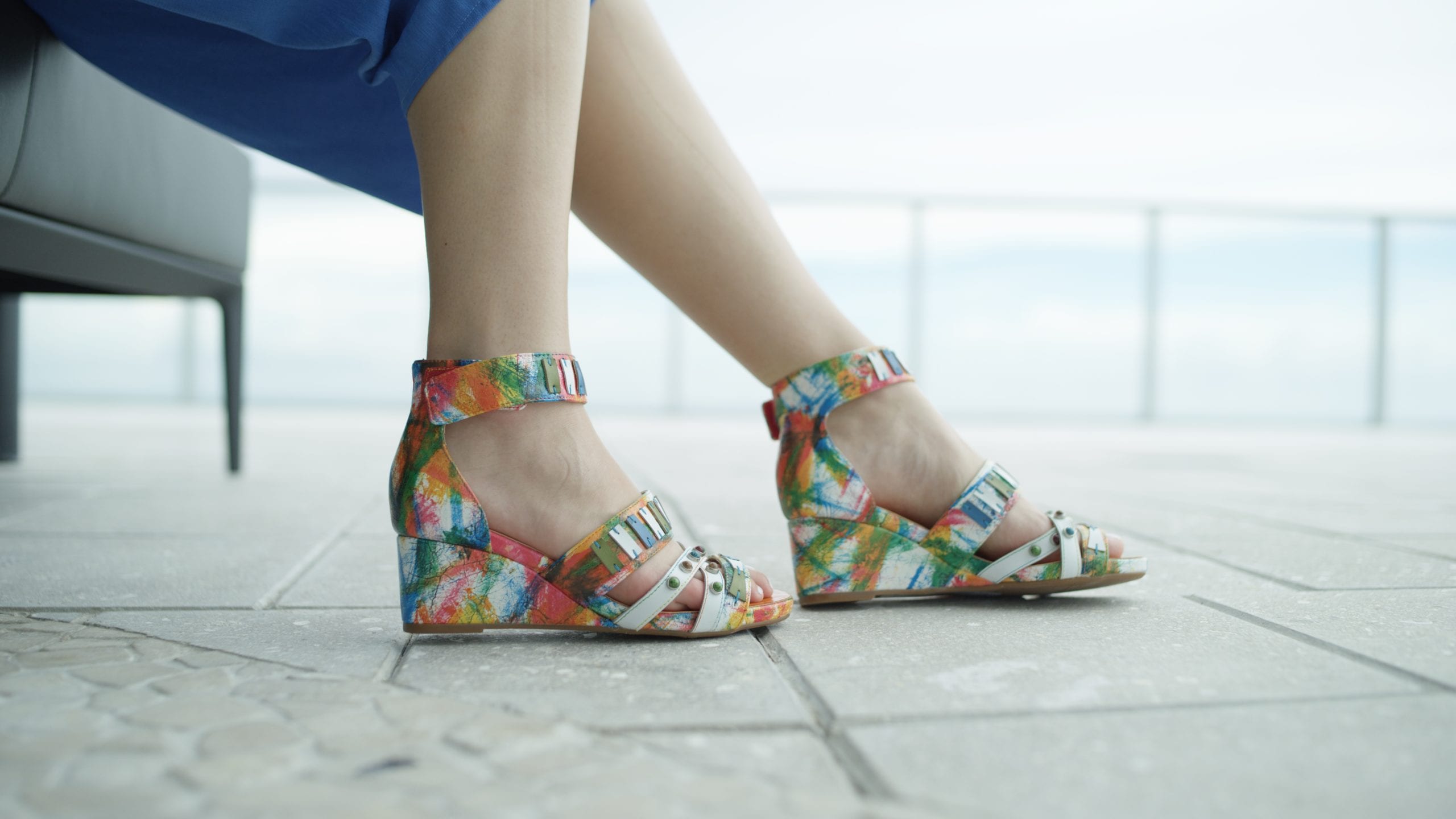 Spring StepLartiste Tiffanita Closeup of colorful heeled shoes being worn by woman