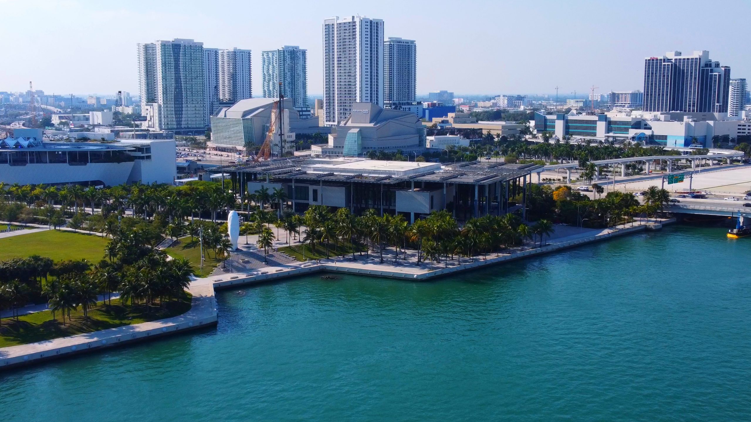 Aerial view of coast with city in the background