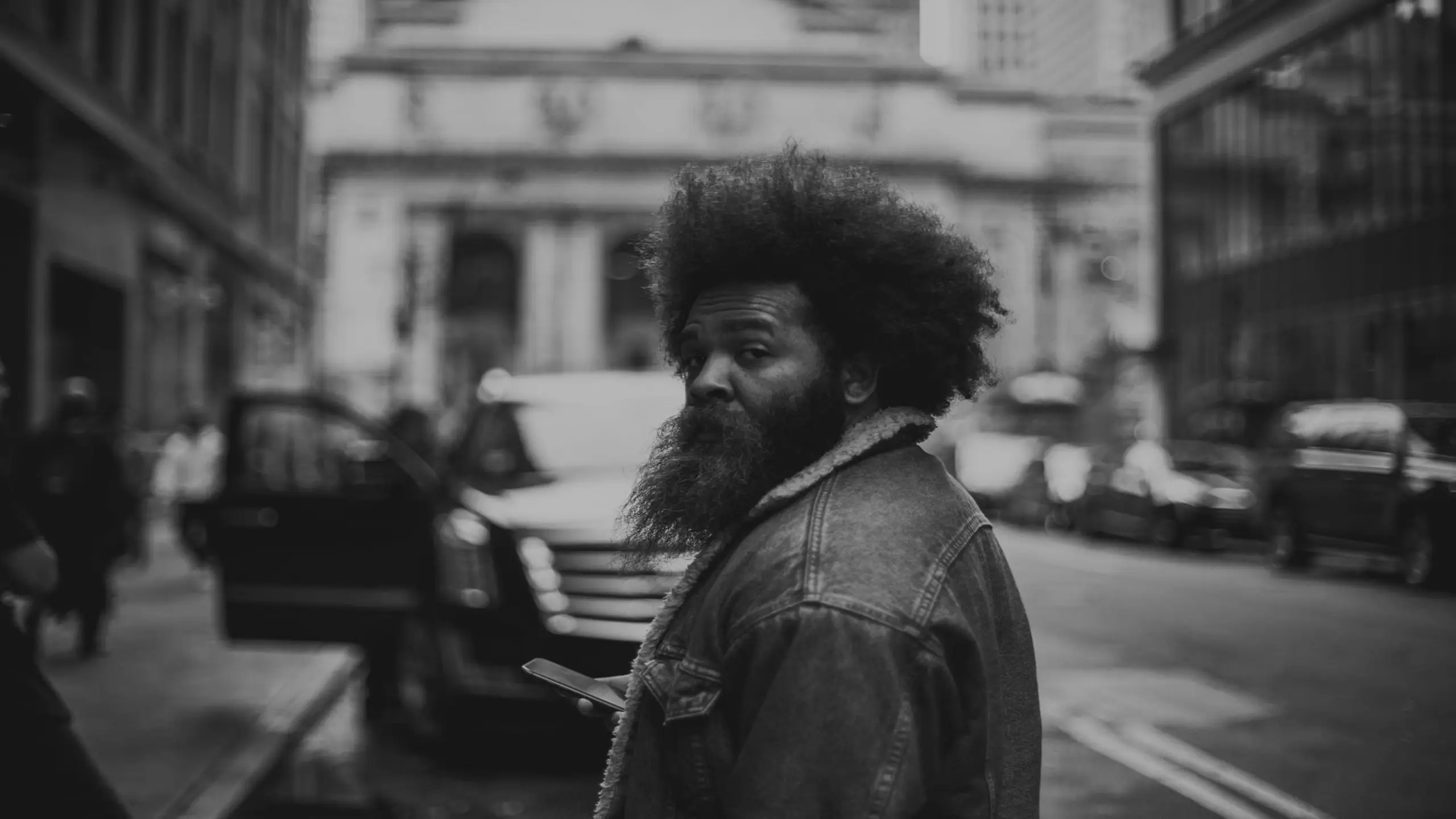cis-about-page-staff-brandon-baker2 Black and white headshot of Brandon Baker looking back at camera