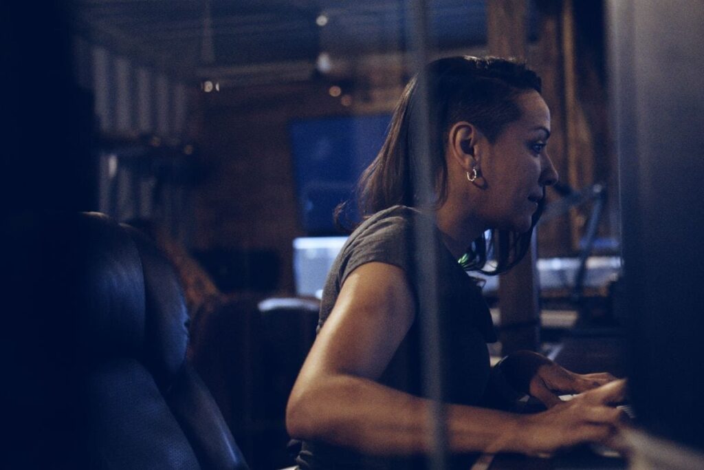 Side profile of Ciara Santiago working on a desktop