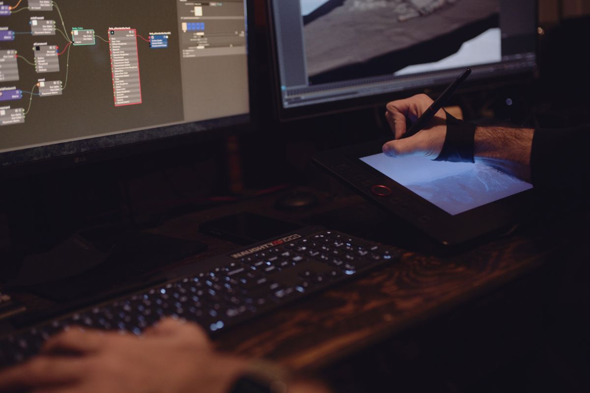 C&I Studios Andres Creates VFX Stills Closeup of crew member working with desktop